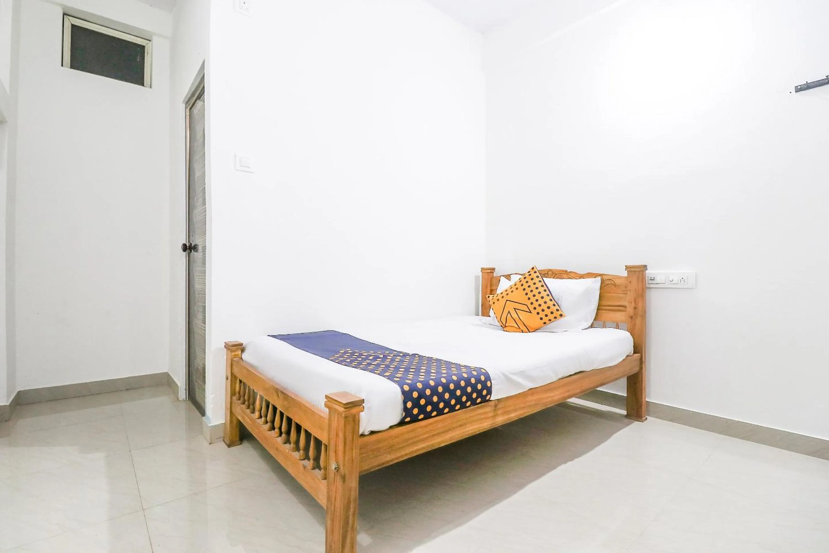 Bedroom, Bed in SPOT ON Rohini Inn Kadampuzha