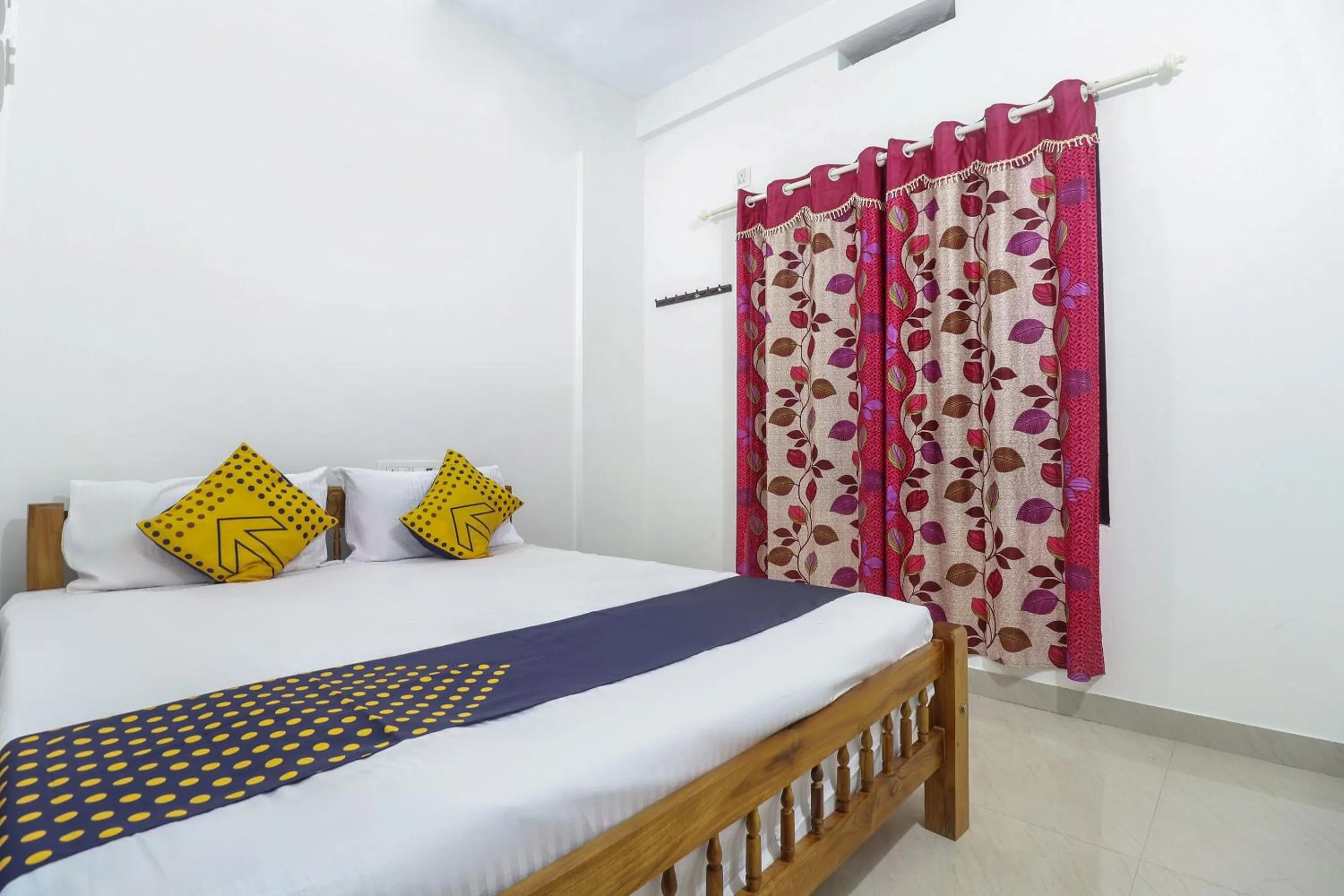 Bedroom, Bed in SPOT ON Rohini Inn Kadampuzha