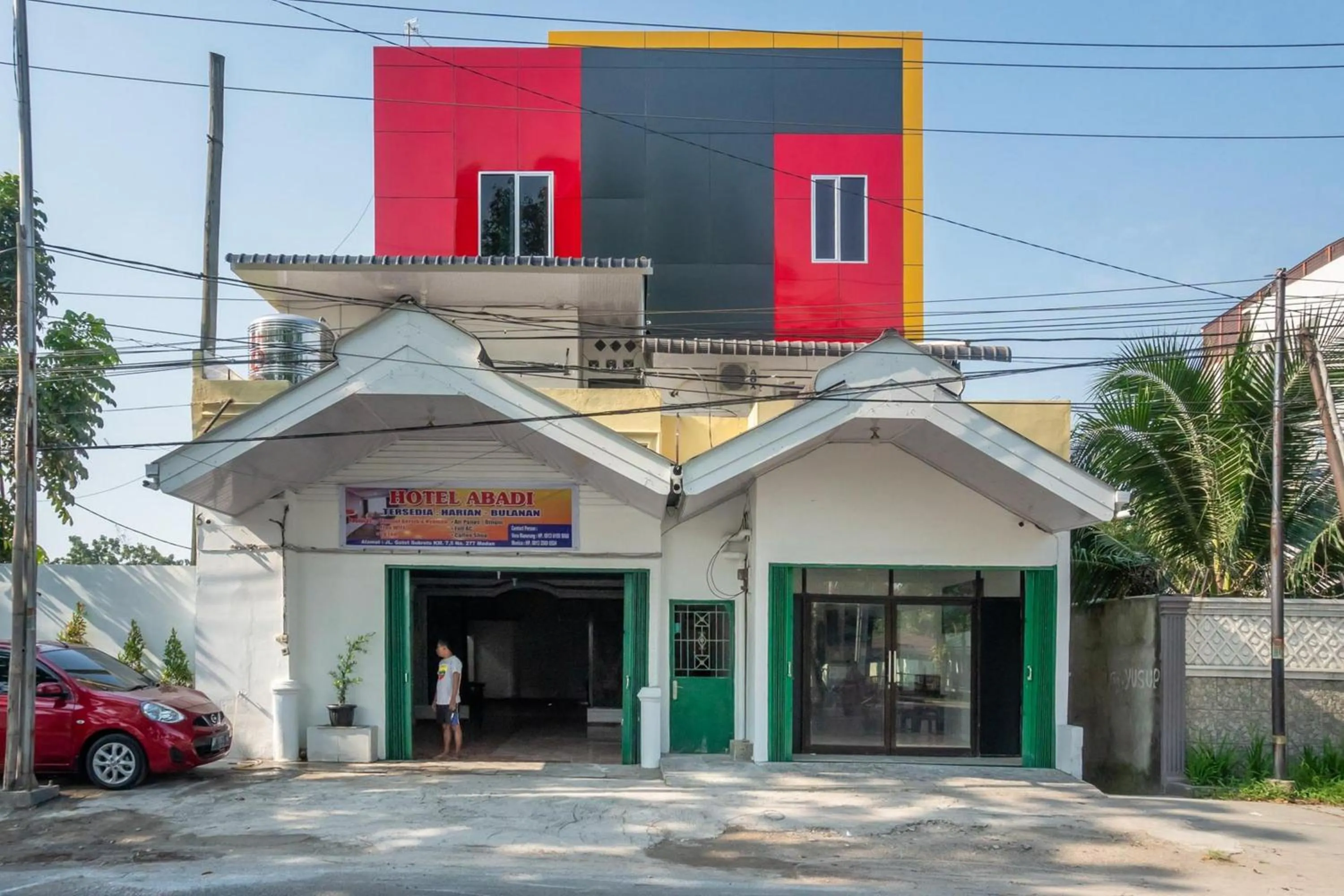 Property logo or sign in RedDoorz near Manhattan Times Square Medan 2