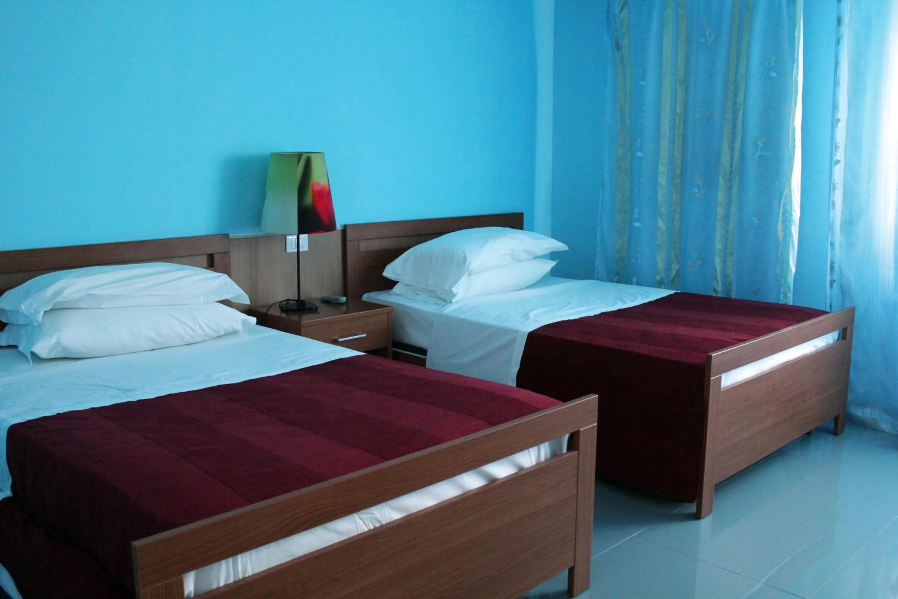 Bedroom, Bed in Hotel 106