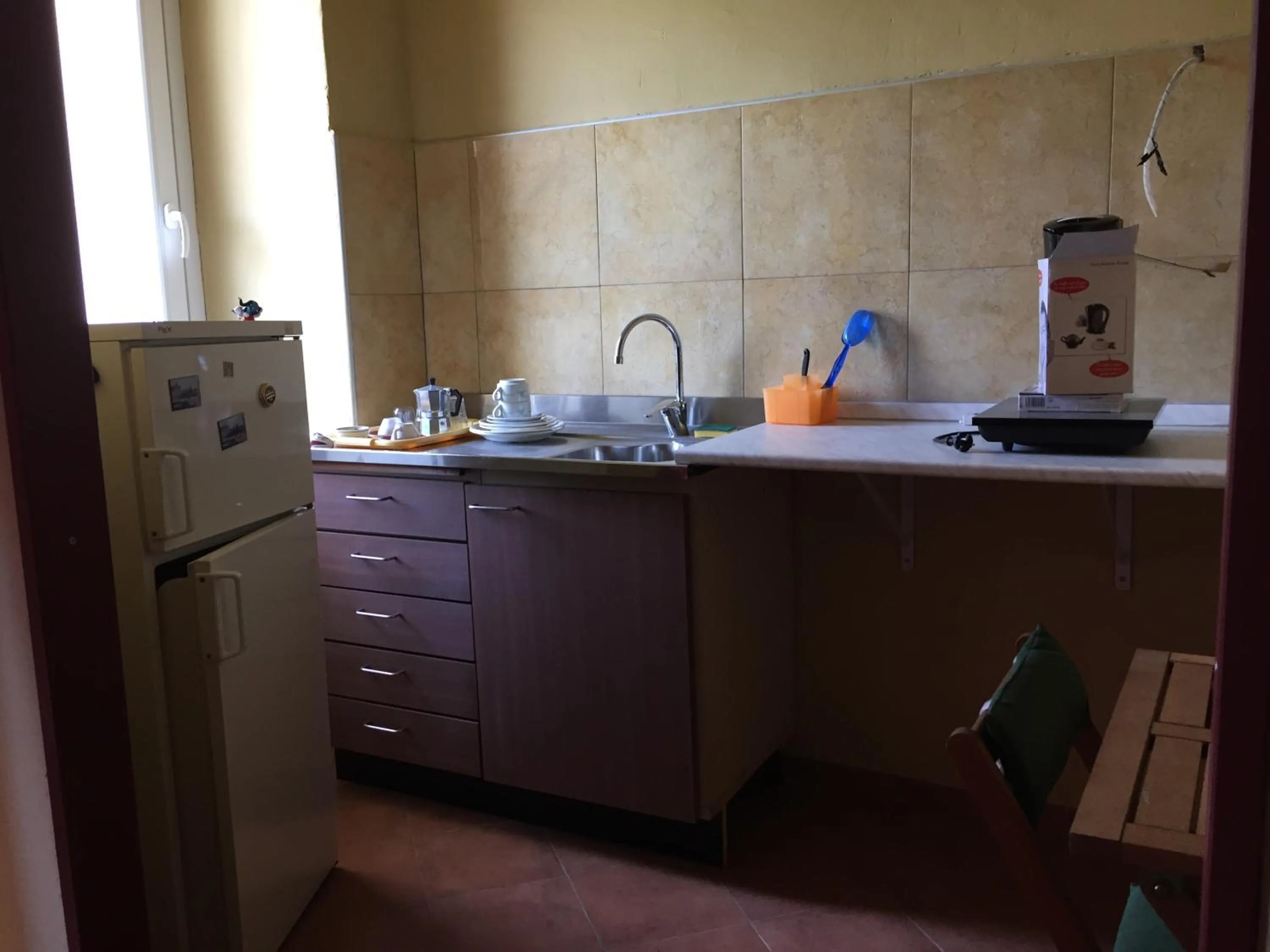 Coffee/tea facilities in Hotel 106