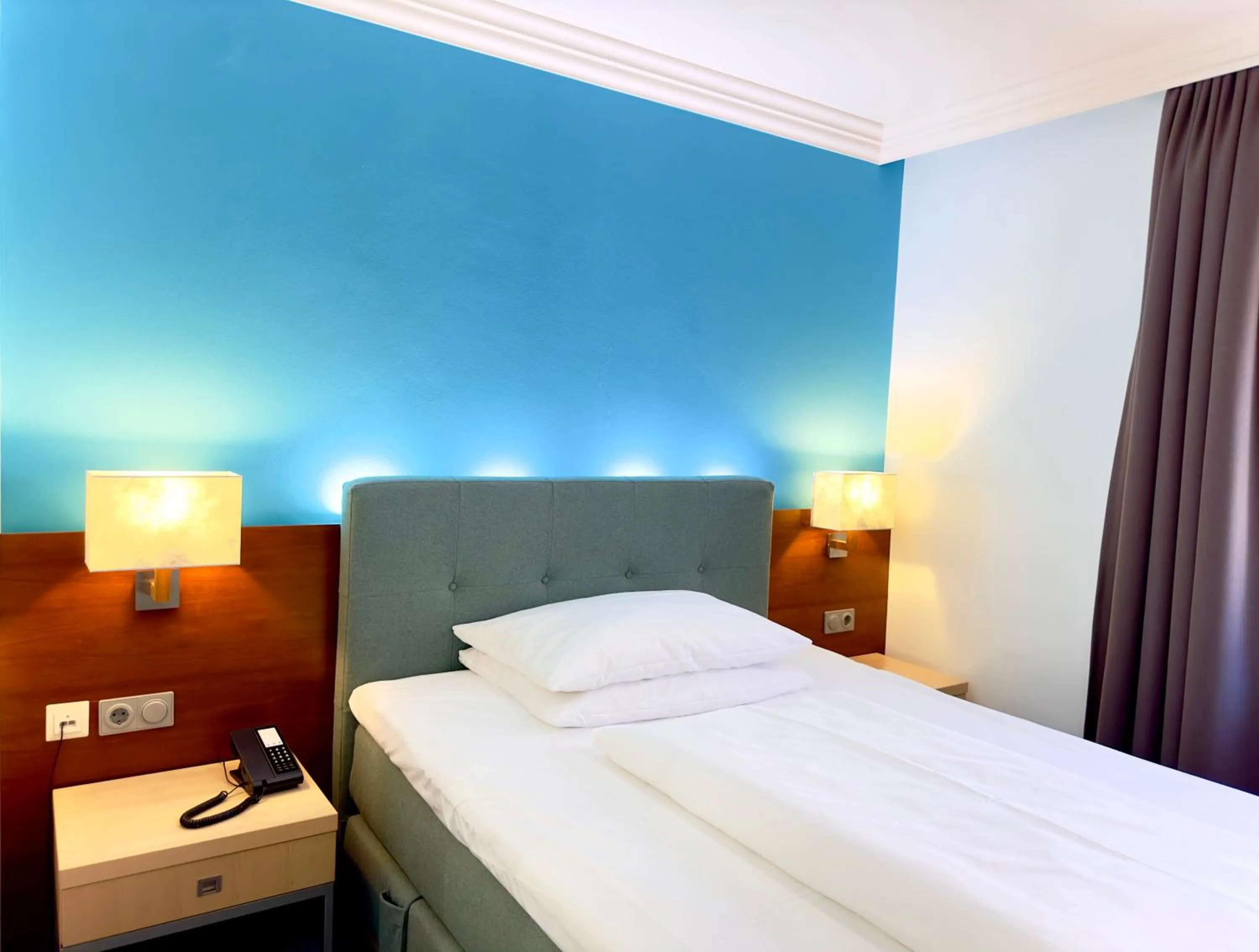 Bed in Prinzhotel Rothenburg