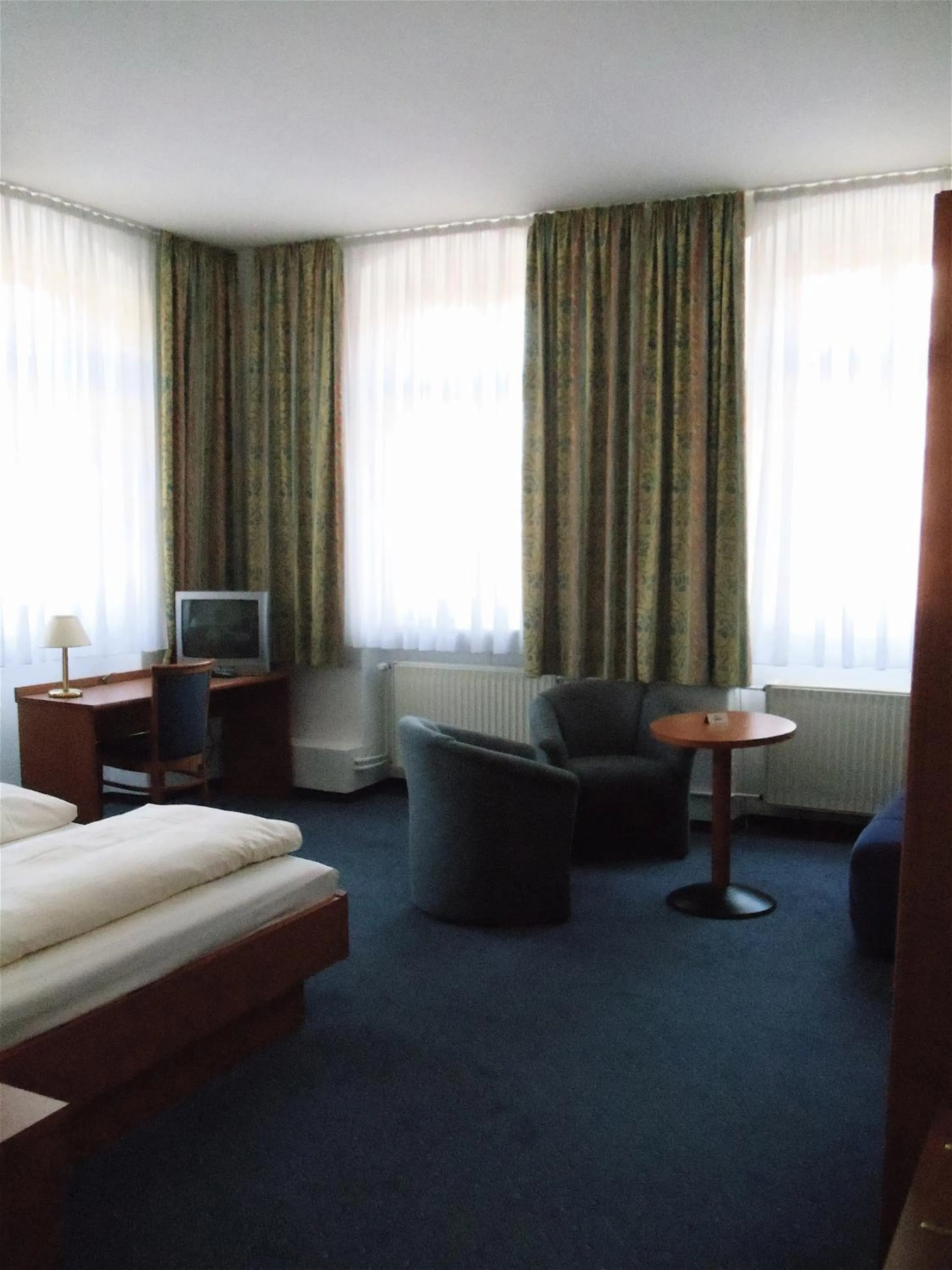 Seating area, Bed in Vier Jahreszeiten