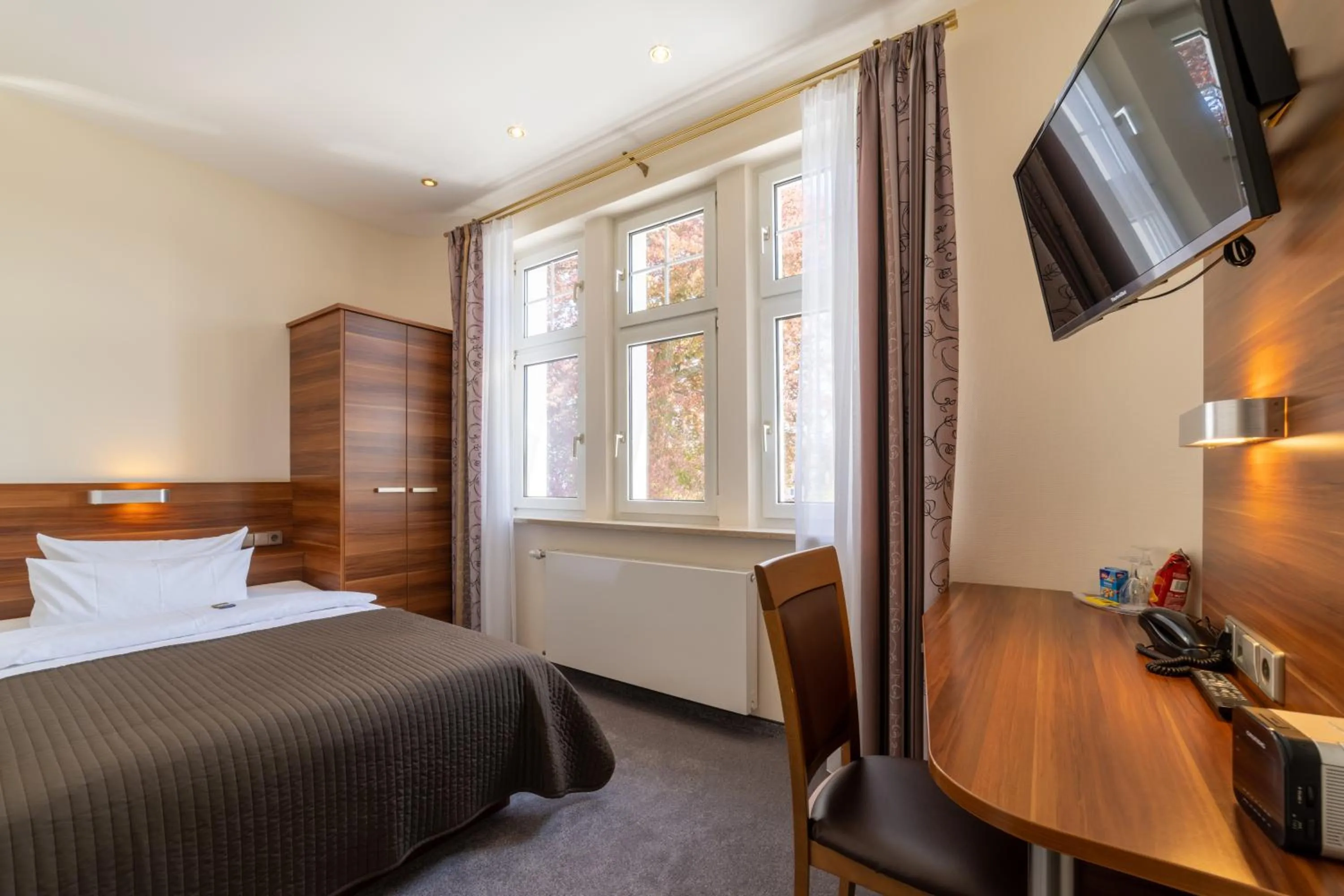 Photo of the whole room, Bed in Hotel Schöngarten garni