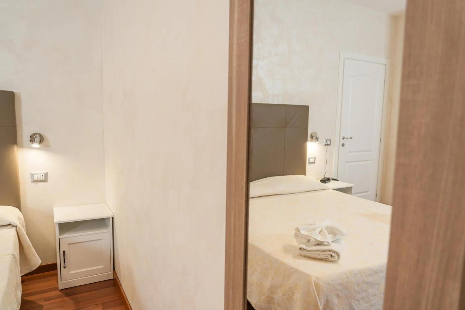 Bed in HOTEL CRISTALLO PAESTUM