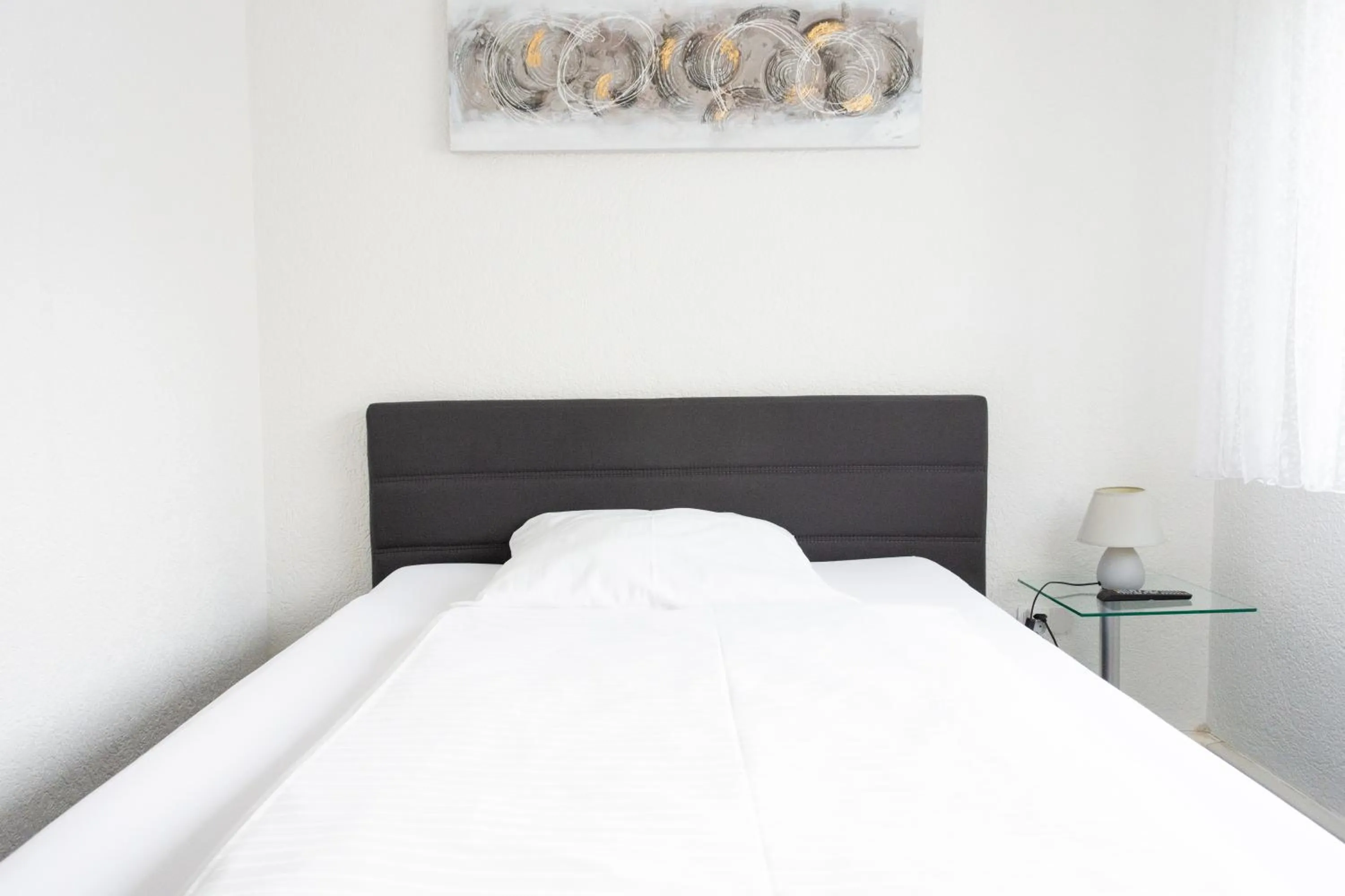 Bed in Hotel-Cocco-Bello in der Villa Foret