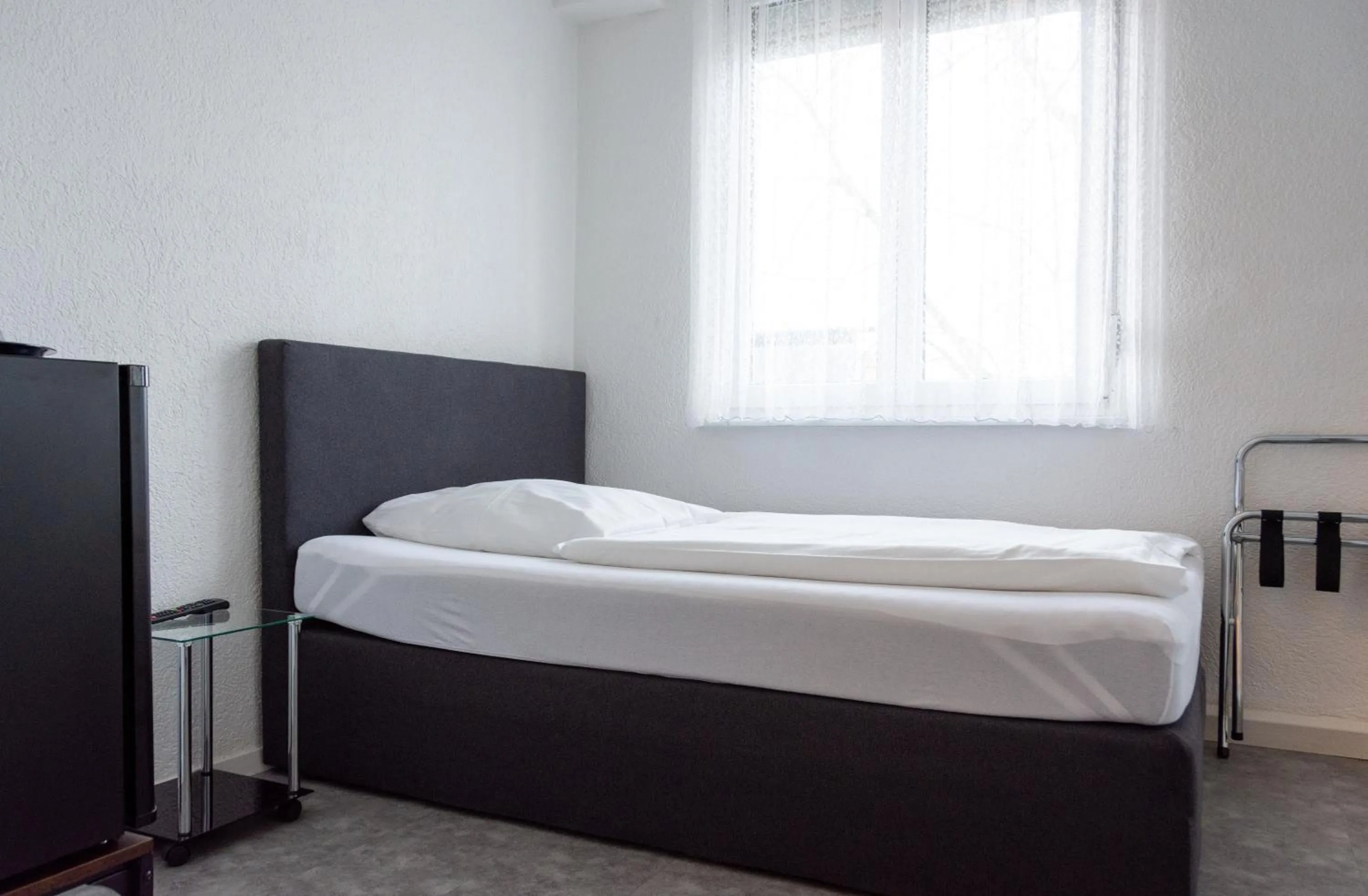 Bed in Hotel-Cocco-Bello in der Villa Foret