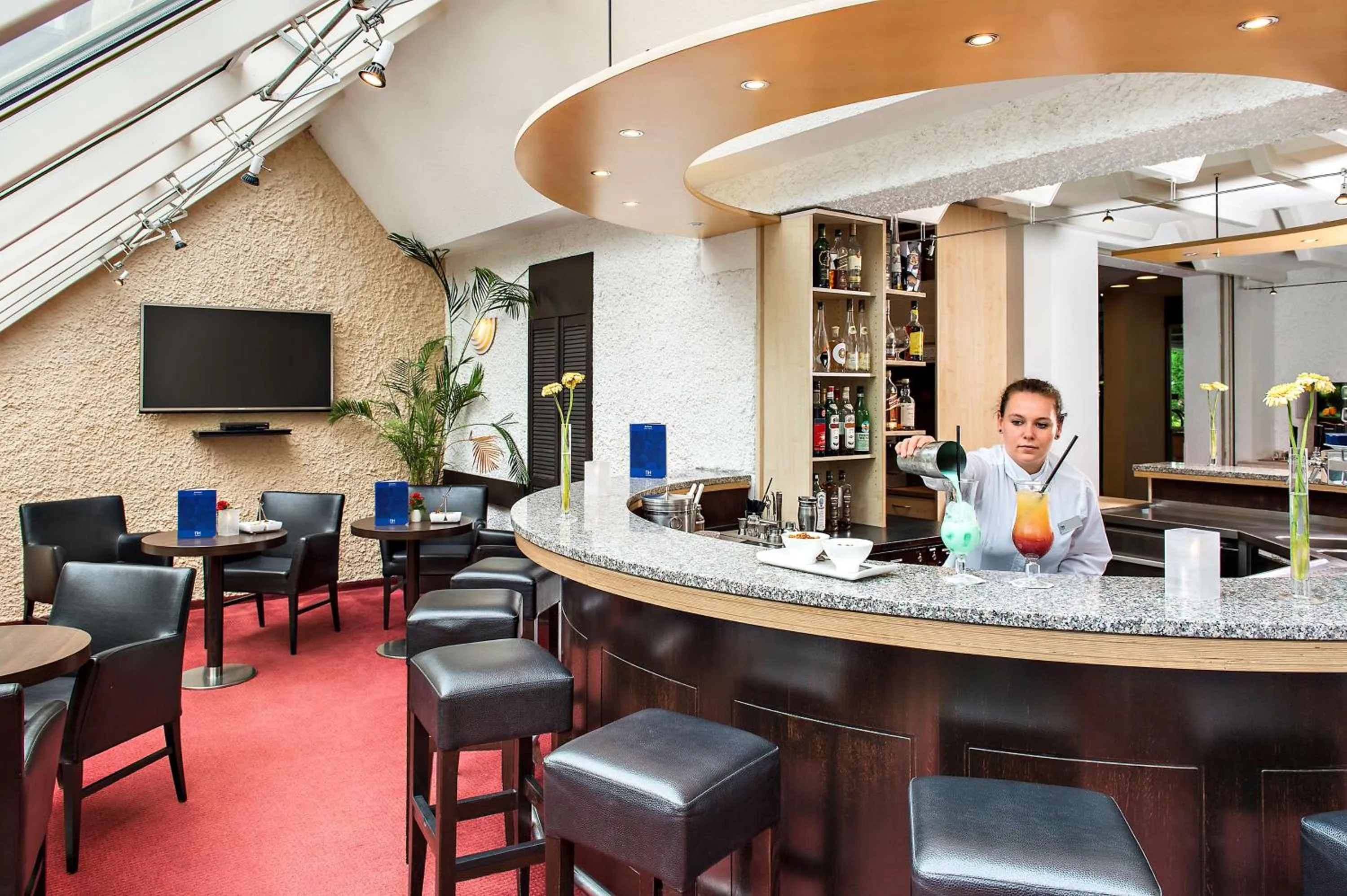 Lounge or bar in NH Hirschberg Heidelberg