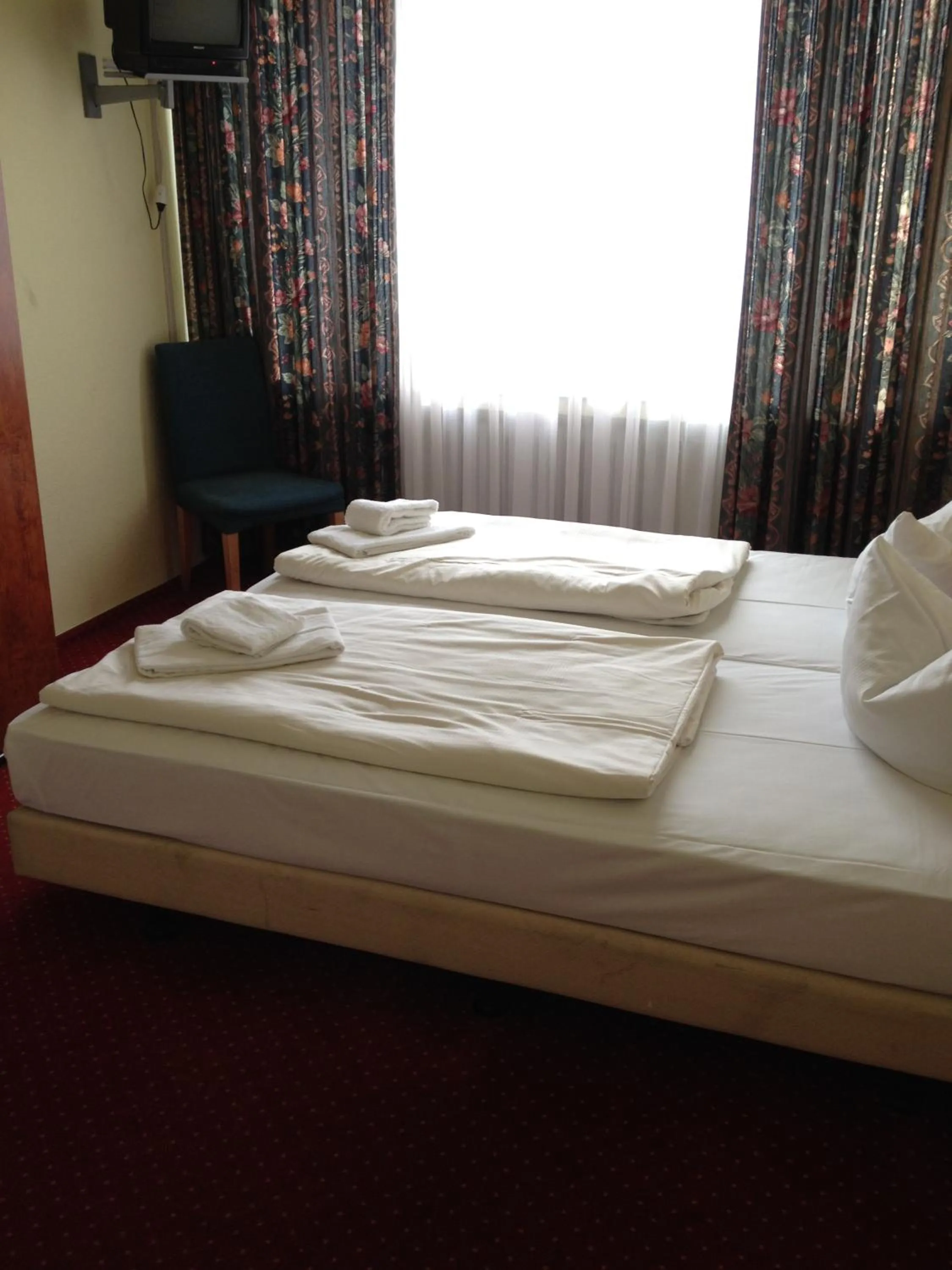 Bed in Domo Hotel Mondial