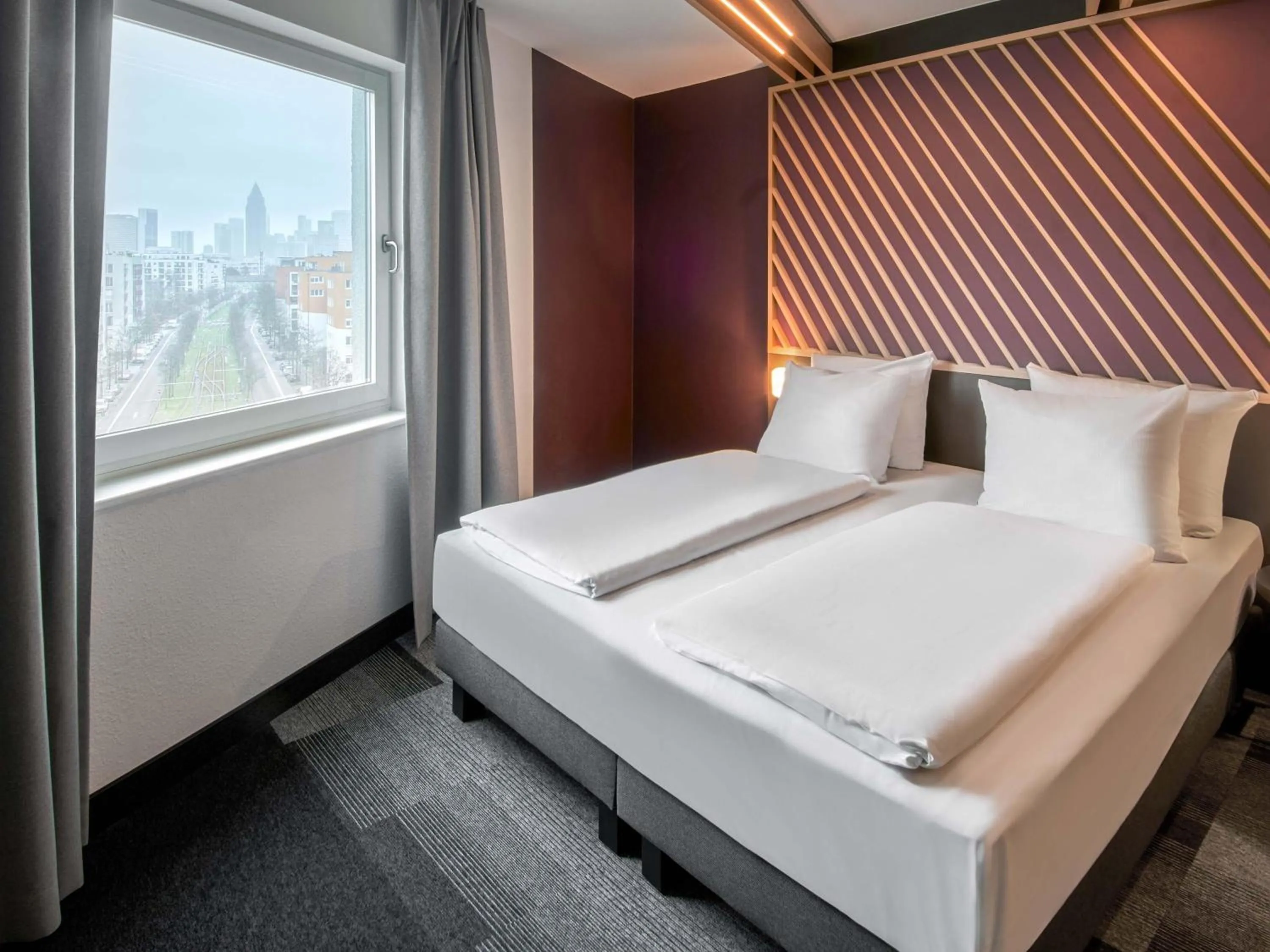 Photo of the whole room, Bed in B&B Hotel Frankfurt-Messe