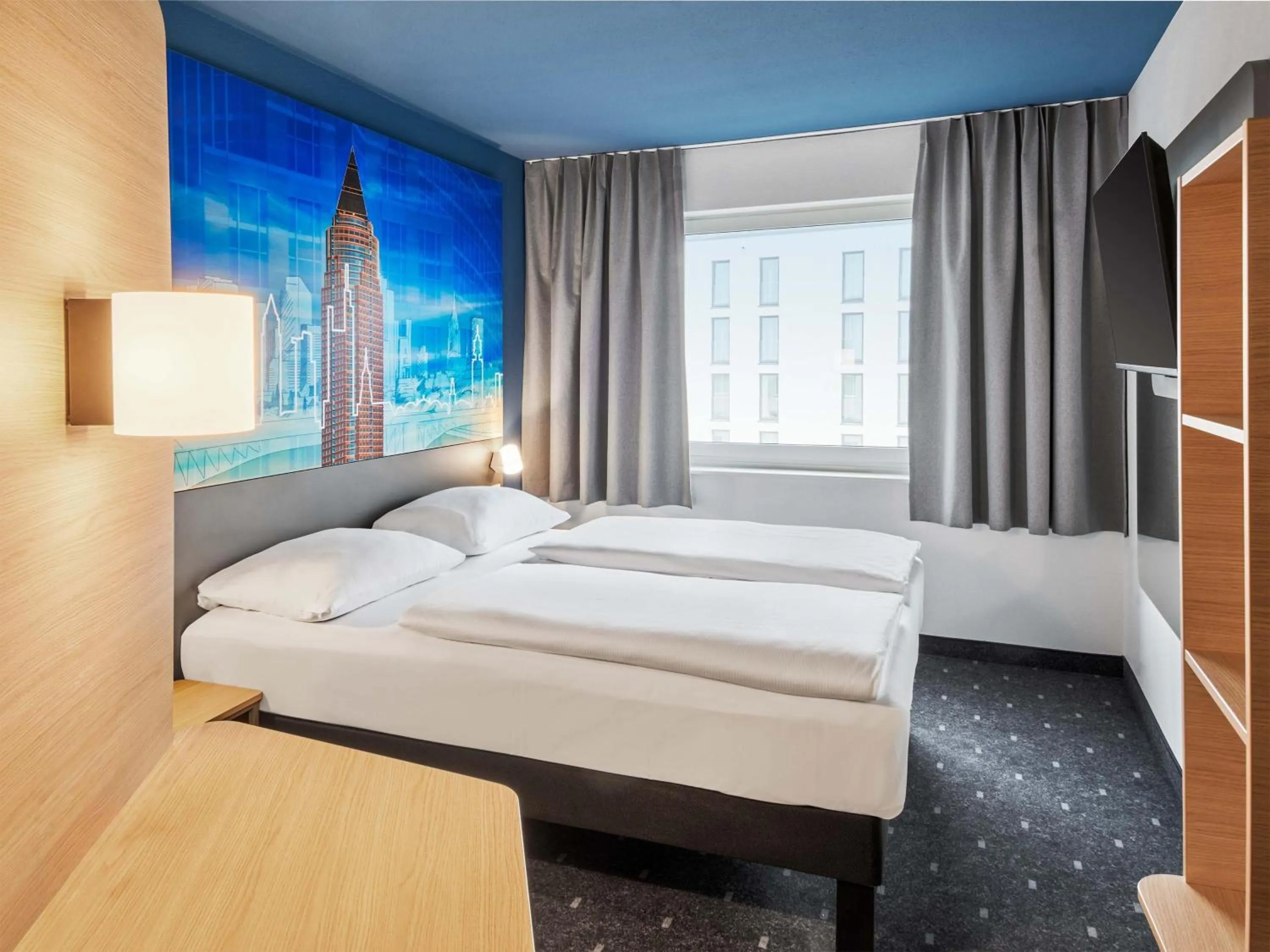 Photo of the whole room, Bed in B&B Hotel Frankfurt-Messe