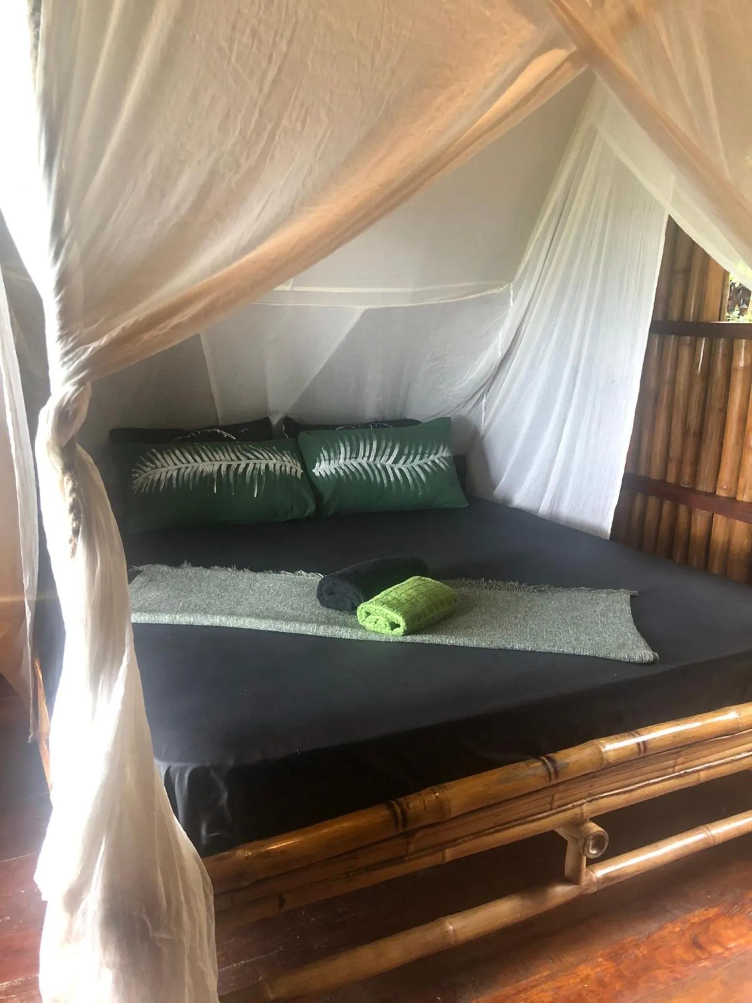 Bed in Sanctuaria Treehouses Busuanga