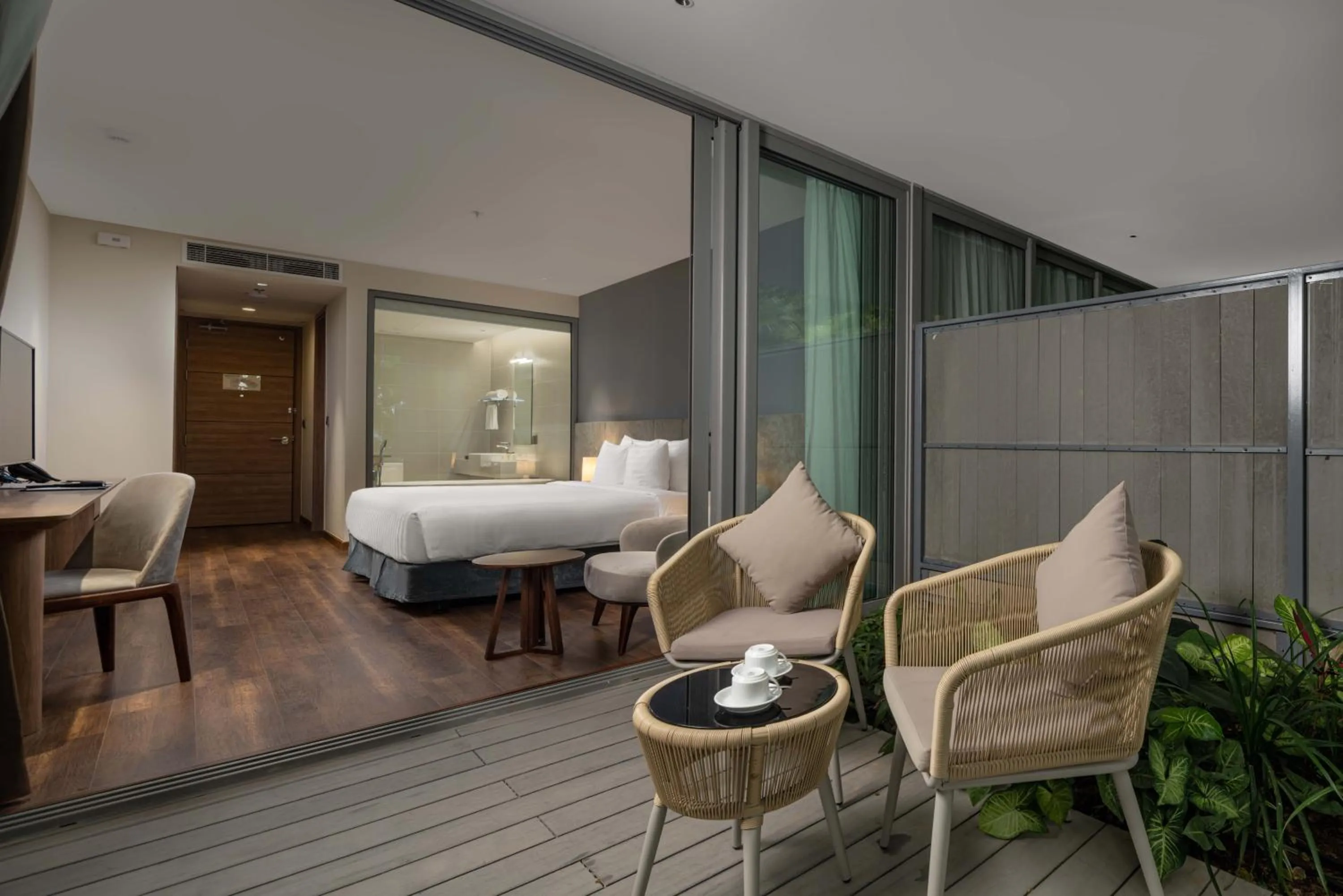 Balcony/Terrace, Bed in Flamingo Cát Bà Resort Managed by Flamingo Hotels & Resorts