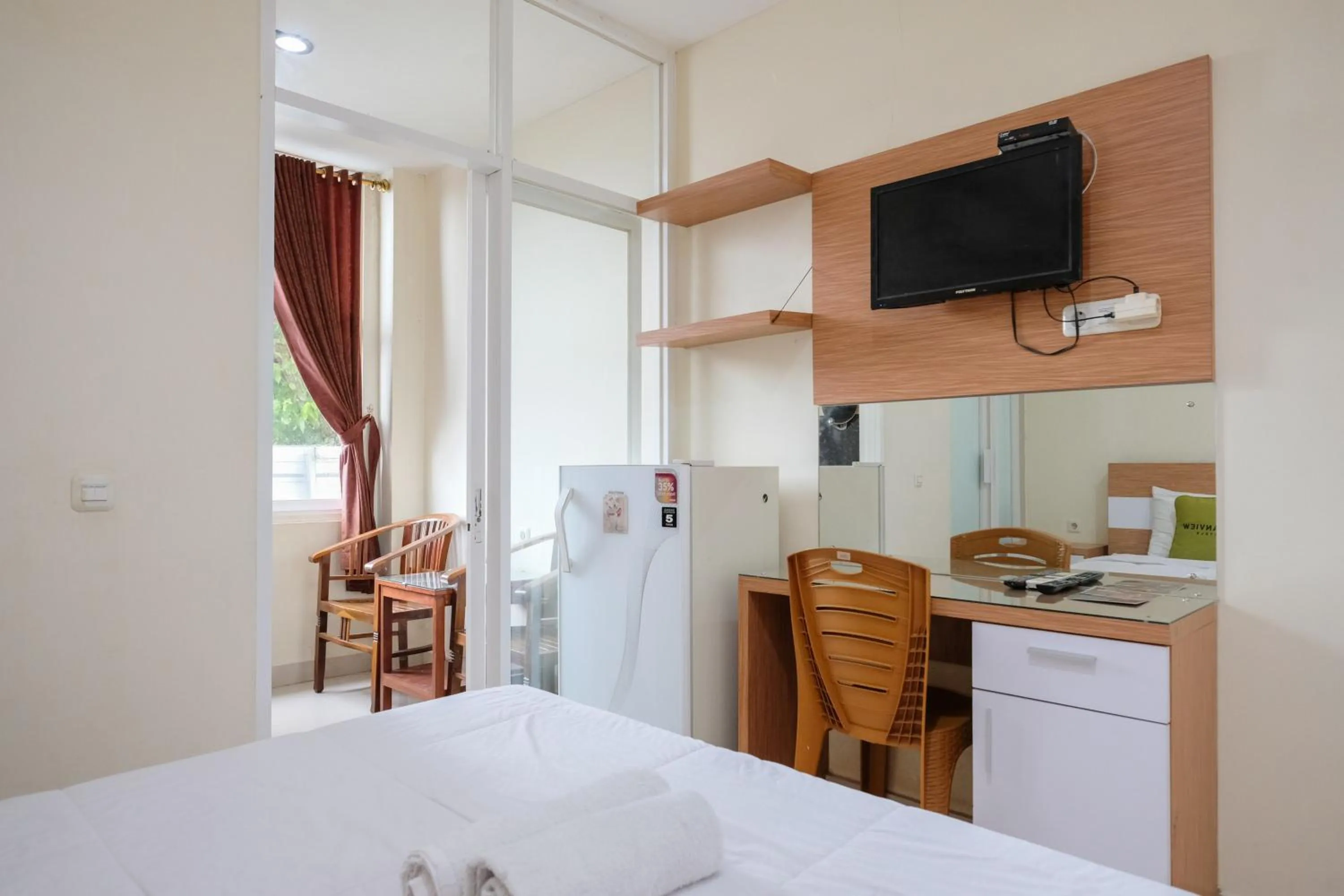 Bedroom, Bed in Urbanview Hotel DHelomi Homestay near UPN Veteran