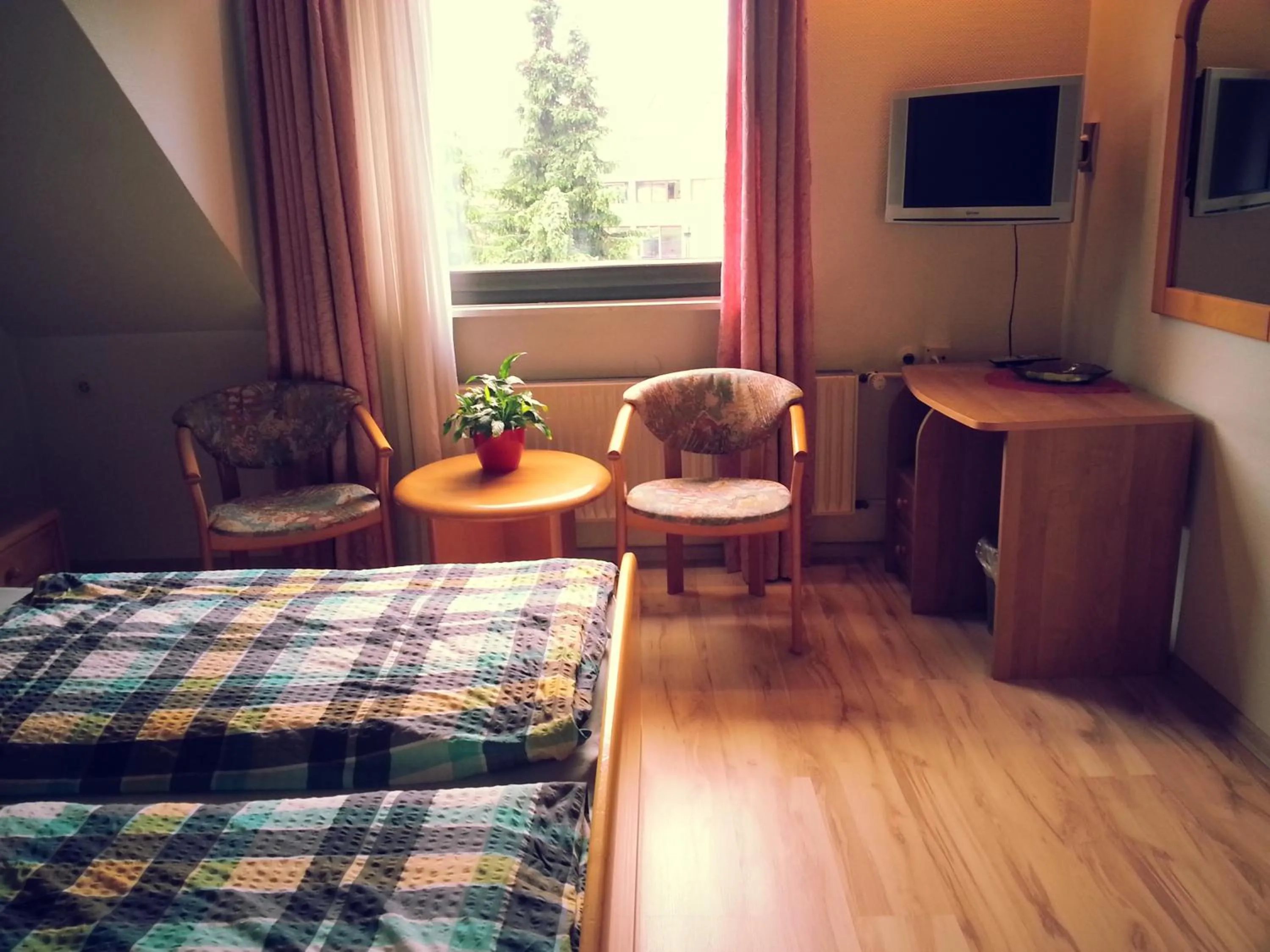 Photo of the whole room, Bed in Naturkost-Hotel Harz