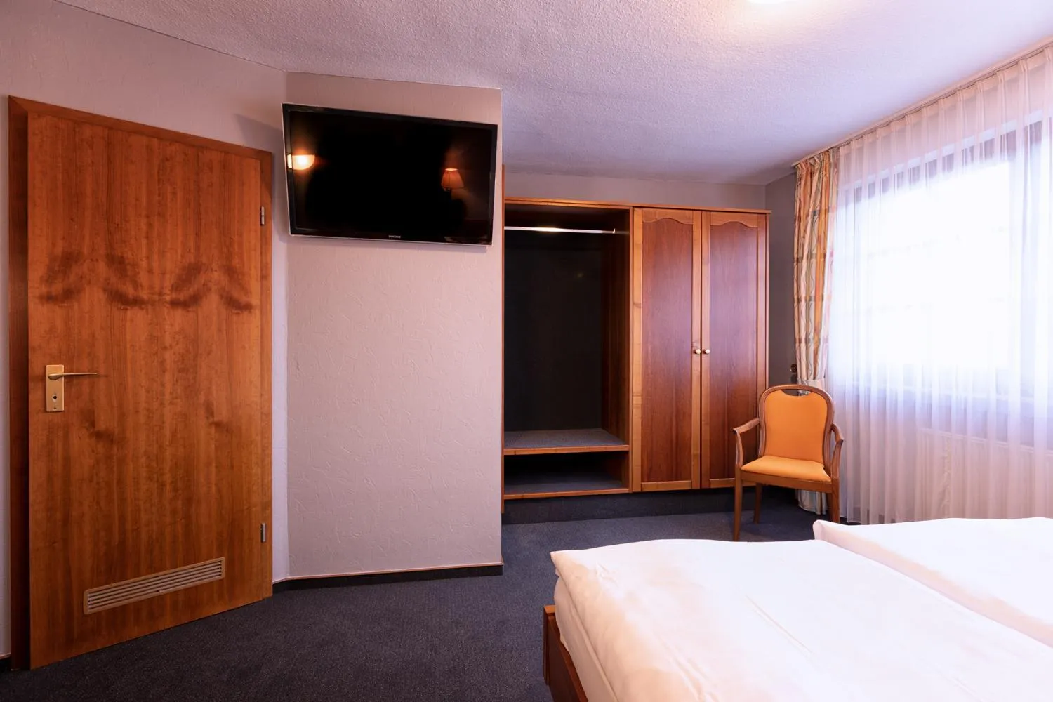 Bed in Hotel-Restaurant Weinhaus Grebel