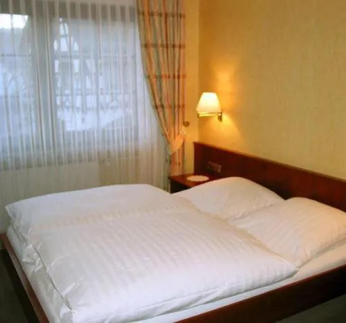 Bed in Hotel-Restaurant Weinhaus Grebel