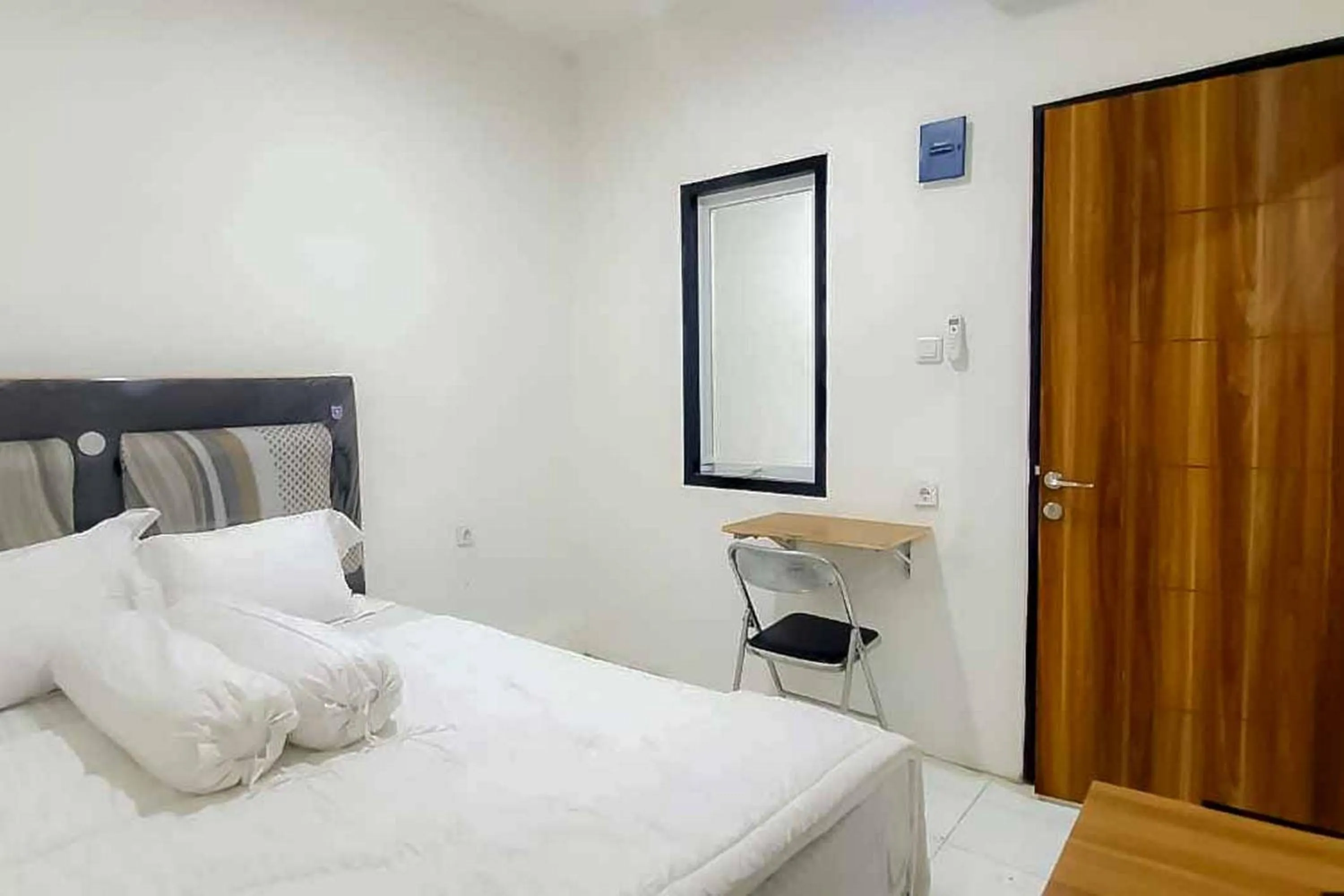 Bed in Maminoti Syariah Residence Mitra RedDoorz