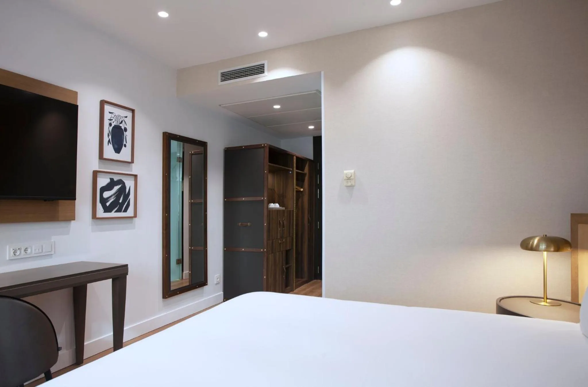 Photo of the whole room, Bed in voco Madrid - Las Tablas by IHG