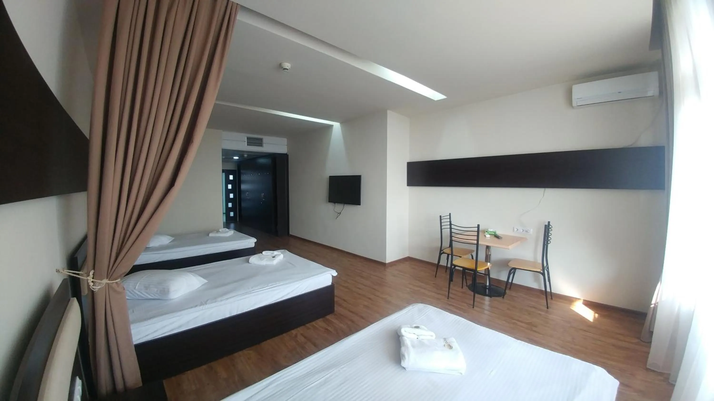 Photo of the whole room, Bed in Cross Health Spa Center