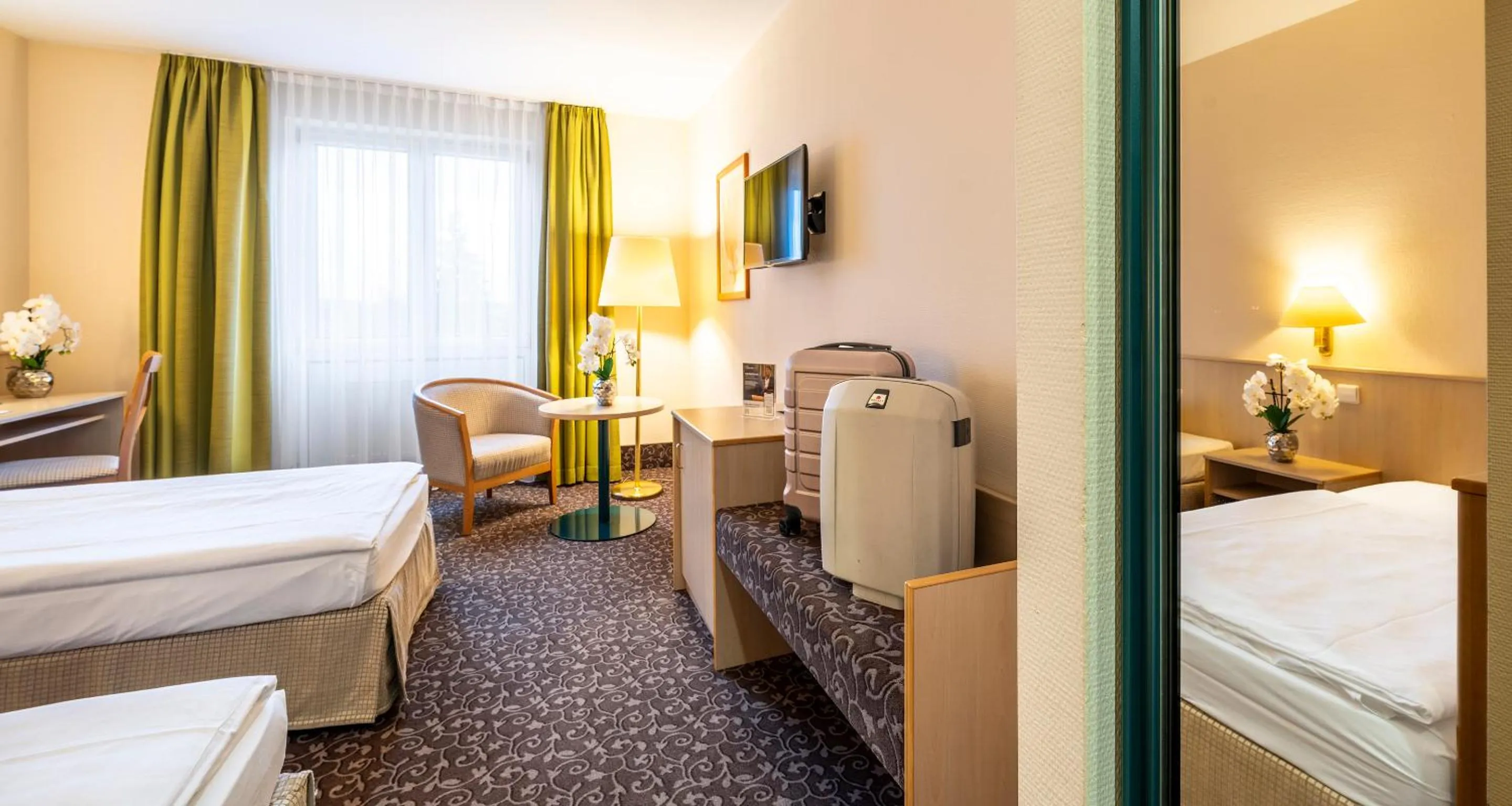 Photo of the whole room, Bed in AMBER HOTEL Chemnitz Park