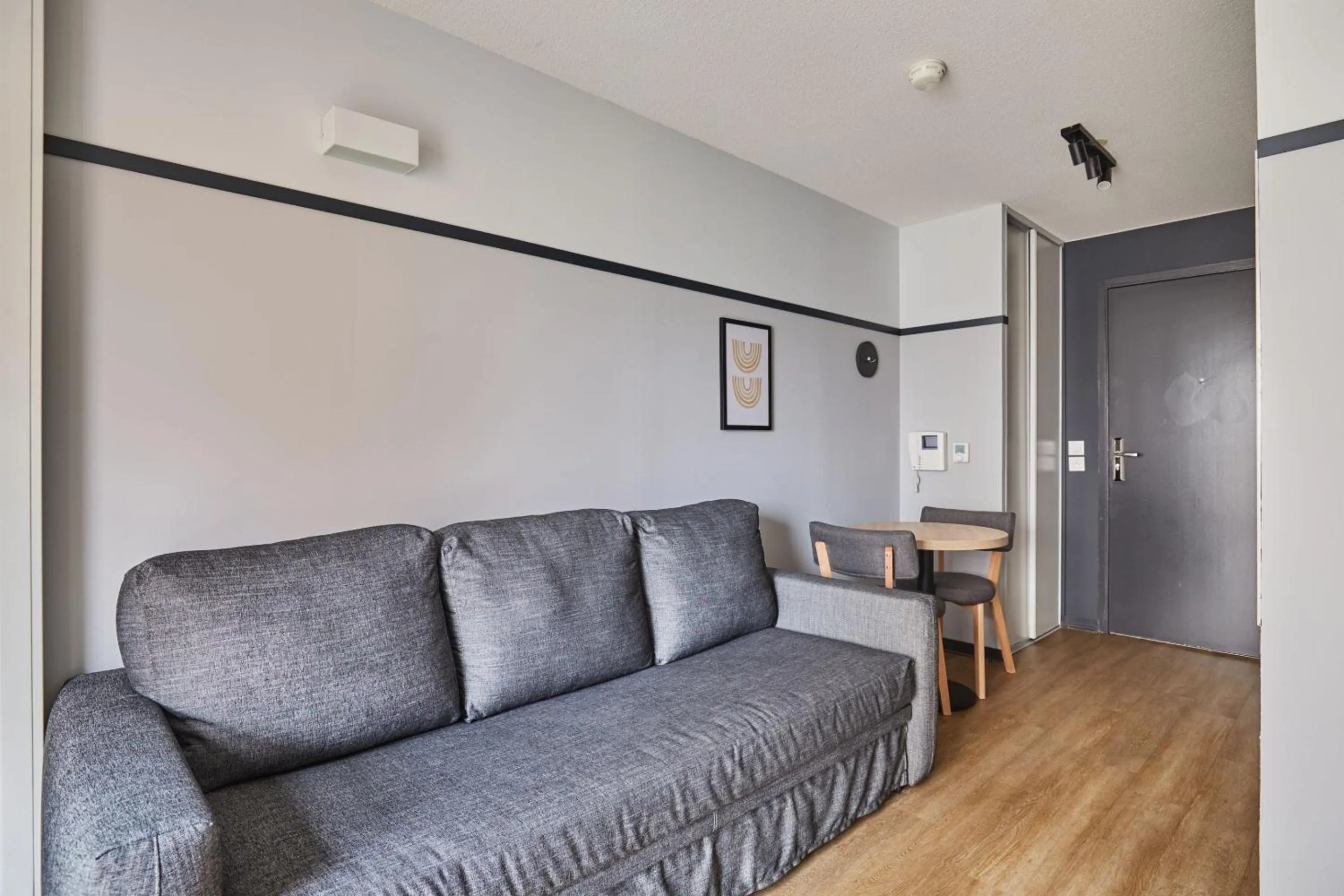 Living room in Appart'hôtel Odalys City - Lyon Centre Confluence