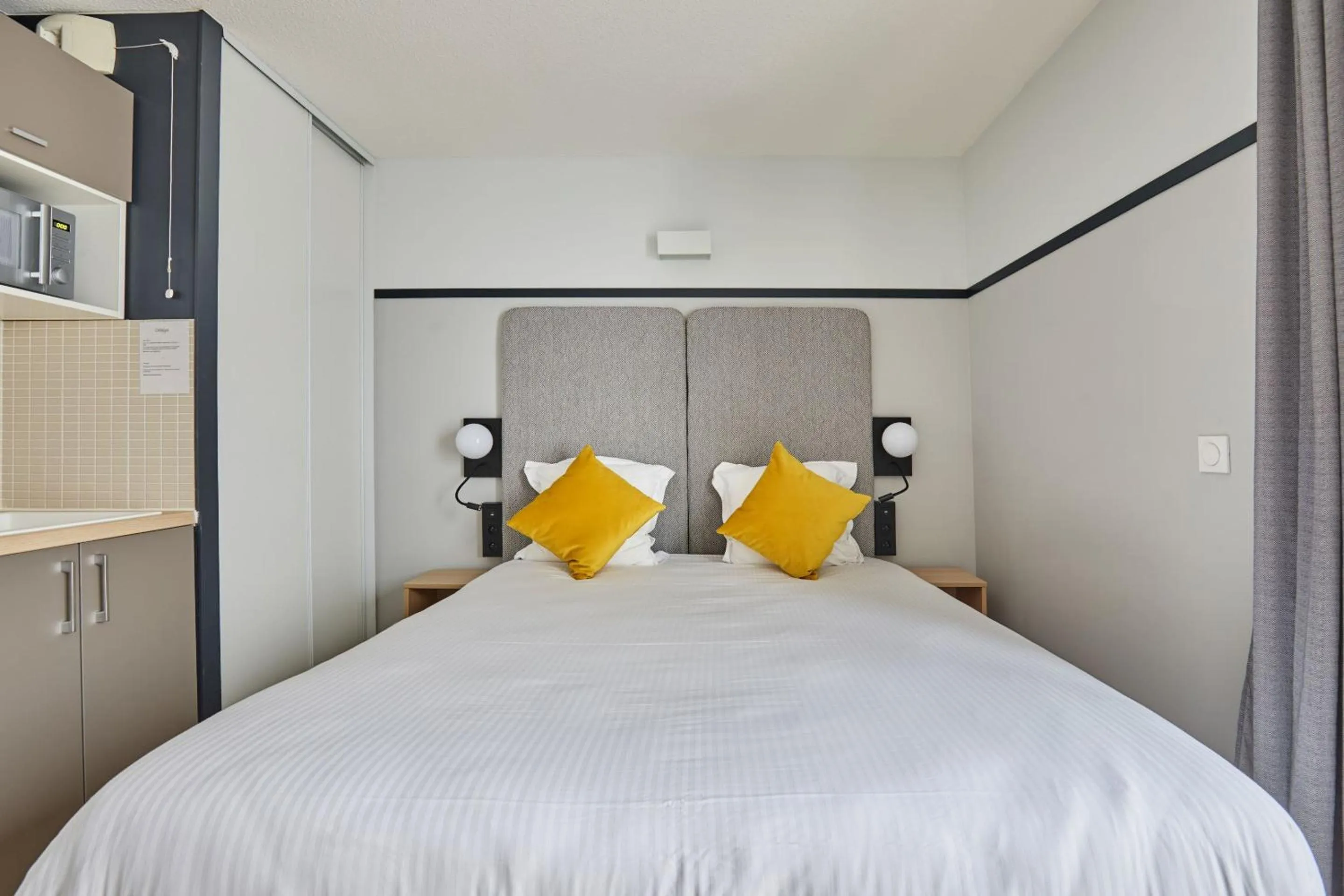 Bed in Appart'hôtel Odalys City - Lyon Centre Confluence