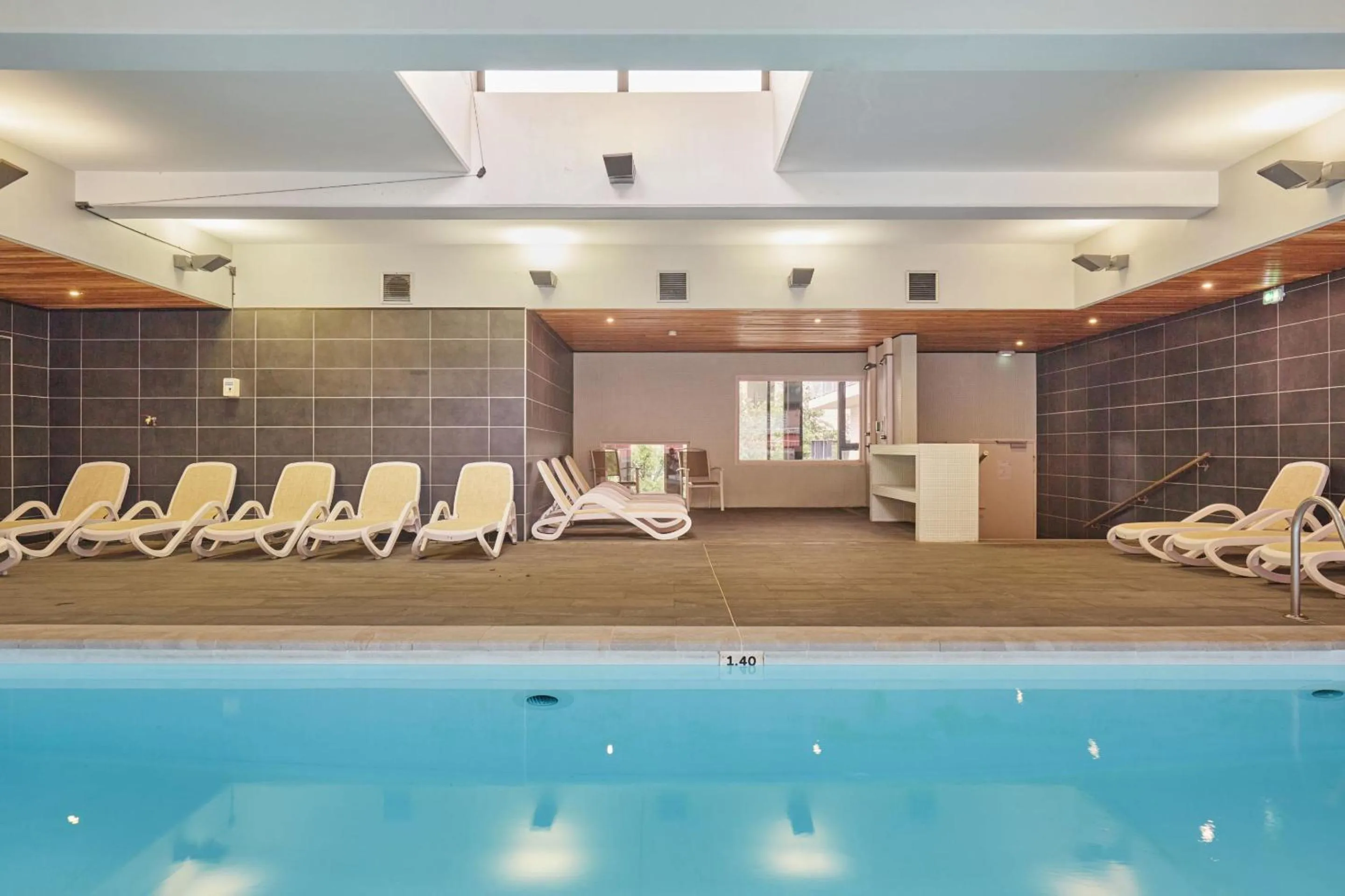 Swimming pool in Appart'hôtel Odalys City - Lyon Centre Confluence