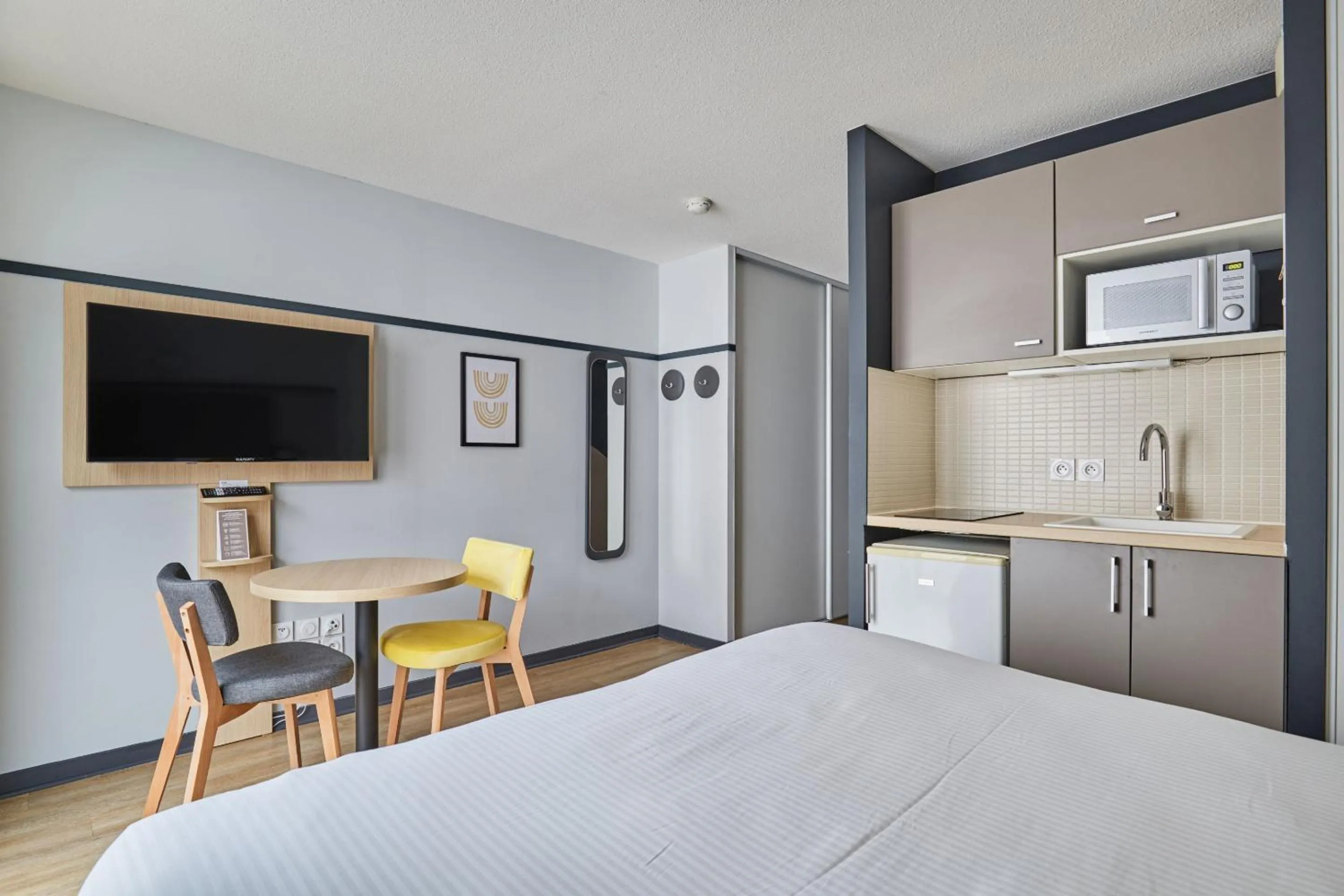 TV and multimedia, Bed in Appart'hôtel Odalys City - Lyon Centre Confluence