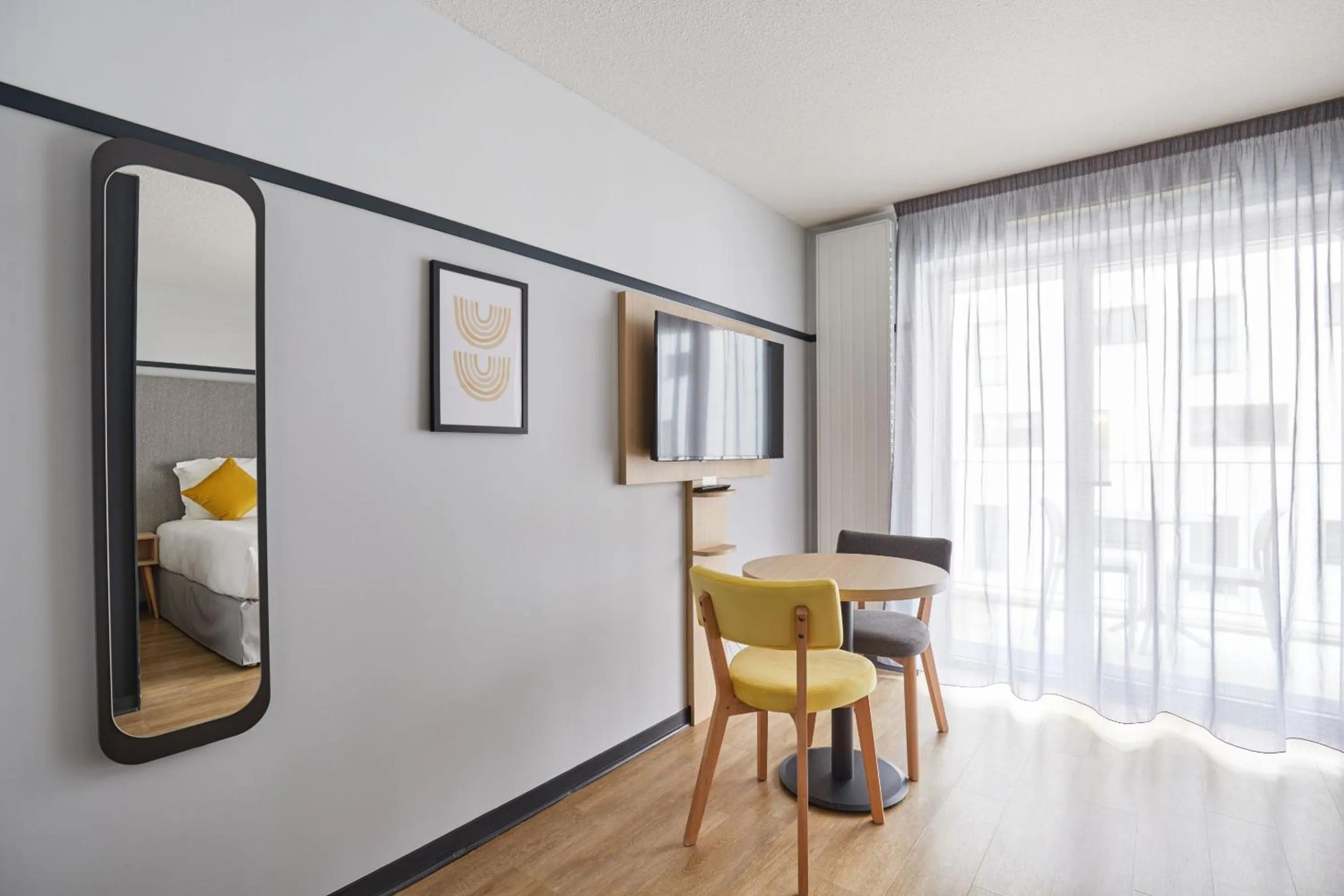 TV and multimedia in Appart'hôtel Odalys City - Lyon Centre Confluence