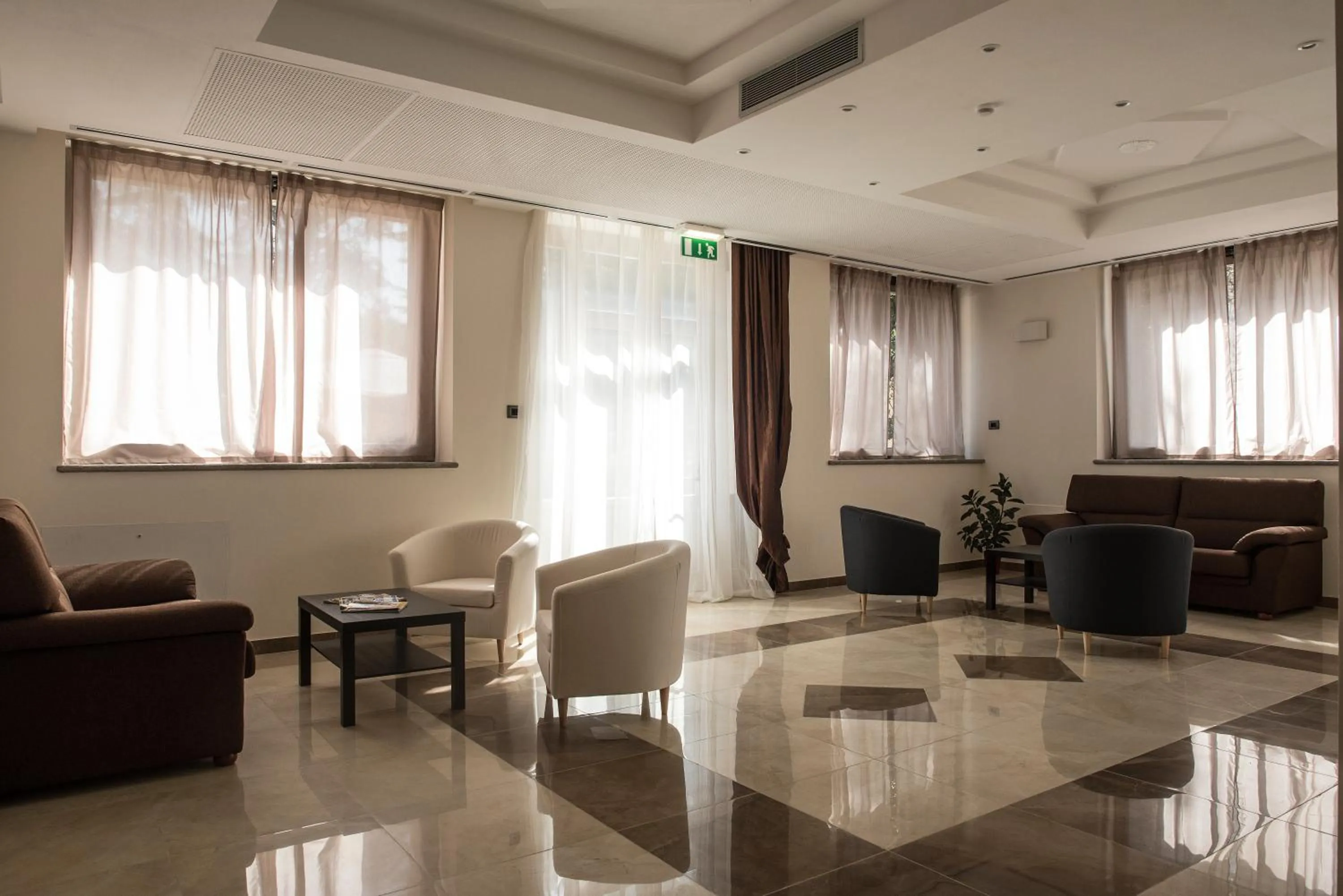 Communal lounge/ TV room in Grand Hotel Impero - Wellness & Exclusive SPA