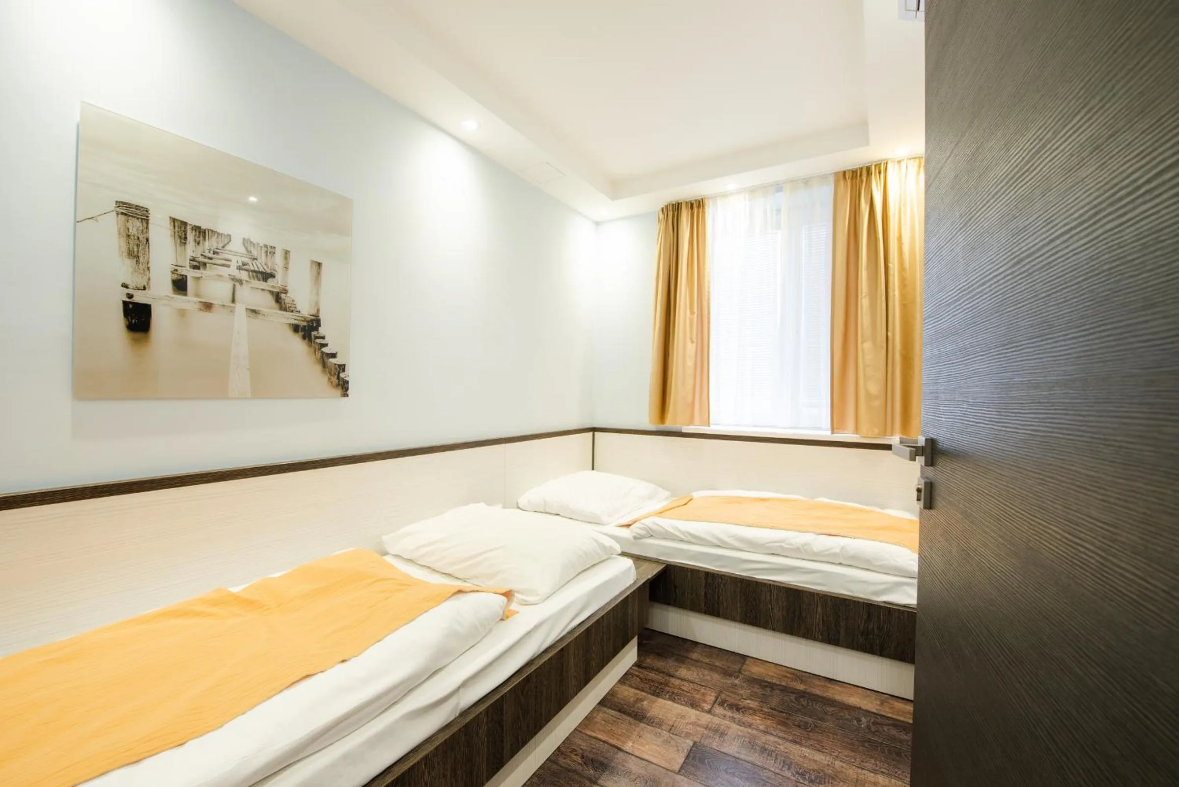 Bed in Apartments Brigitte