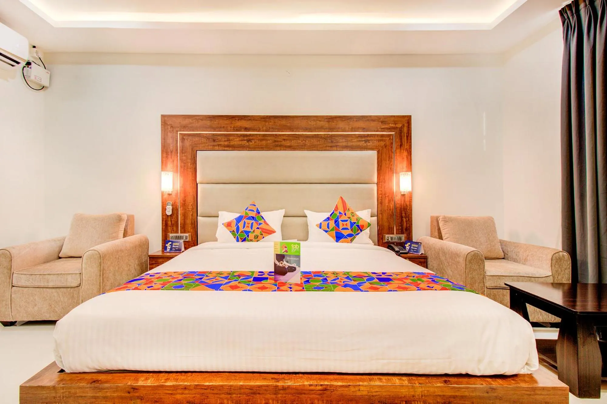 Bed in FabHotel The Royal Suites - Nr Gopalan innovation mall