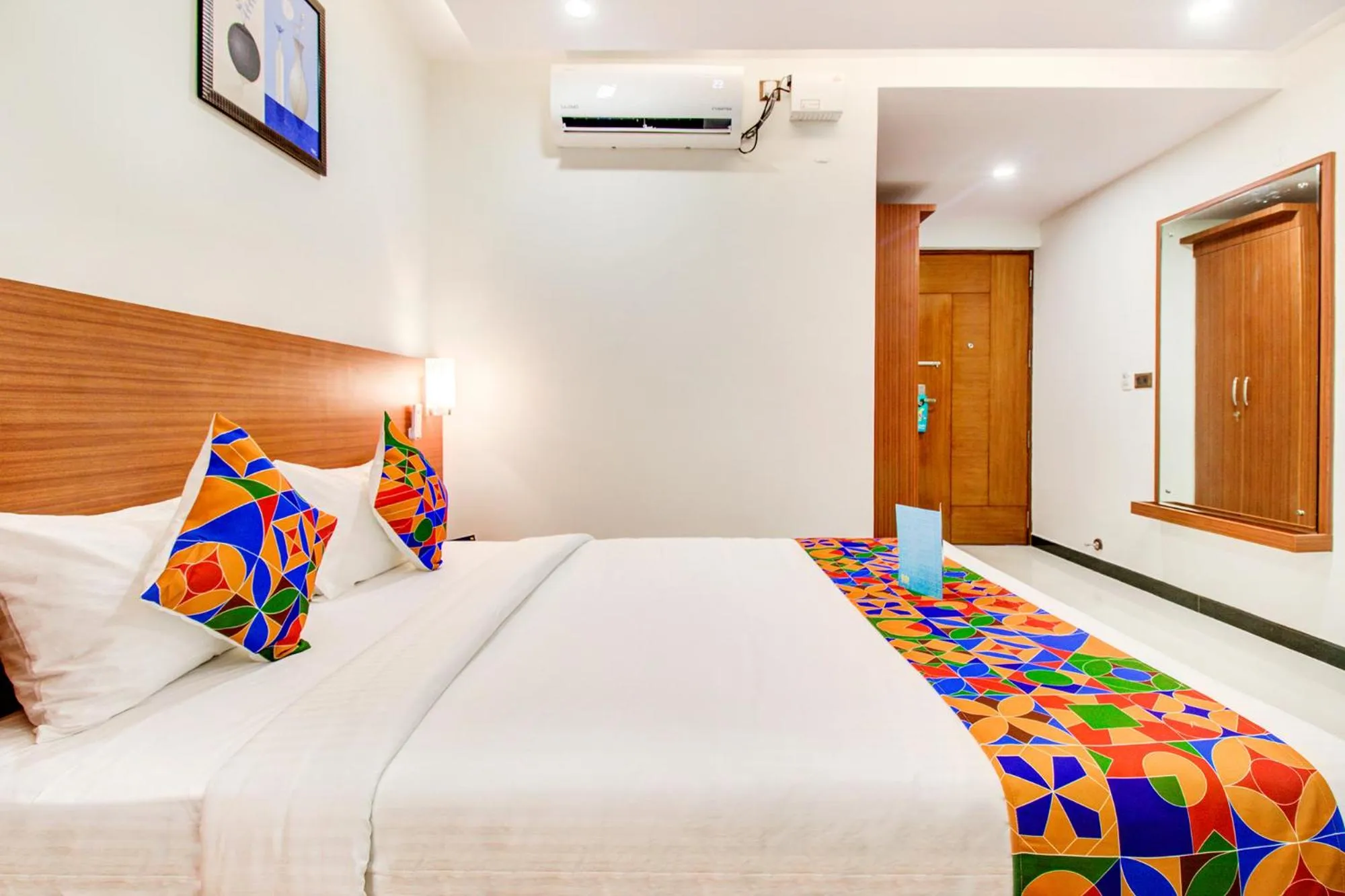 Bed in FabHotel The Royal Suites - Nr Gopalan innovation mall