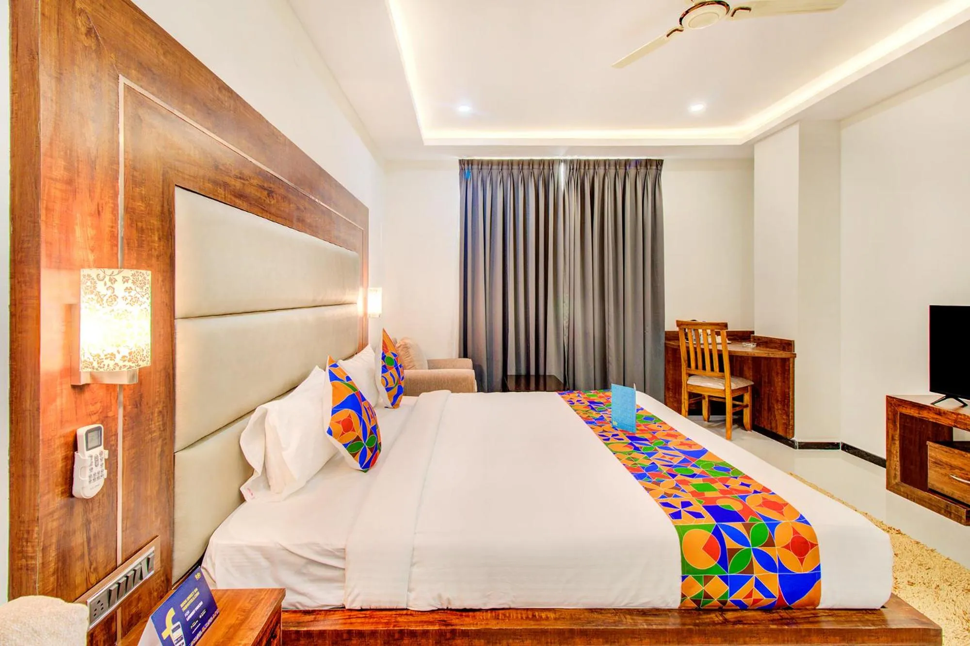 Bed in FabHotel The Royal Suites - Nr Gopalan innovation mall