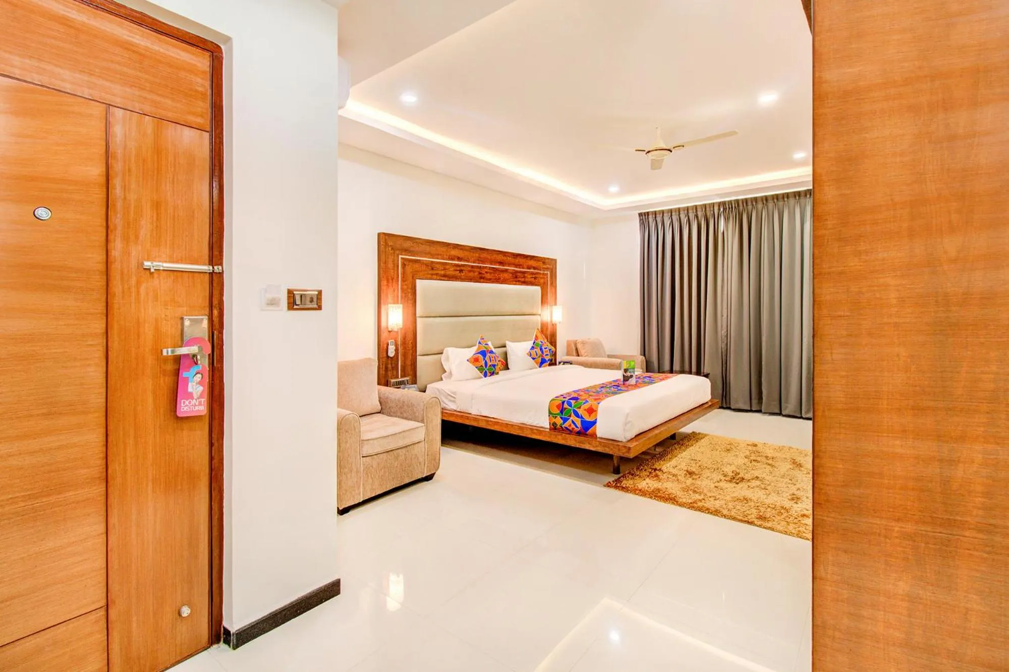 Bed in FabHotel The Royal Suites - Nr Gopalan innovation mall