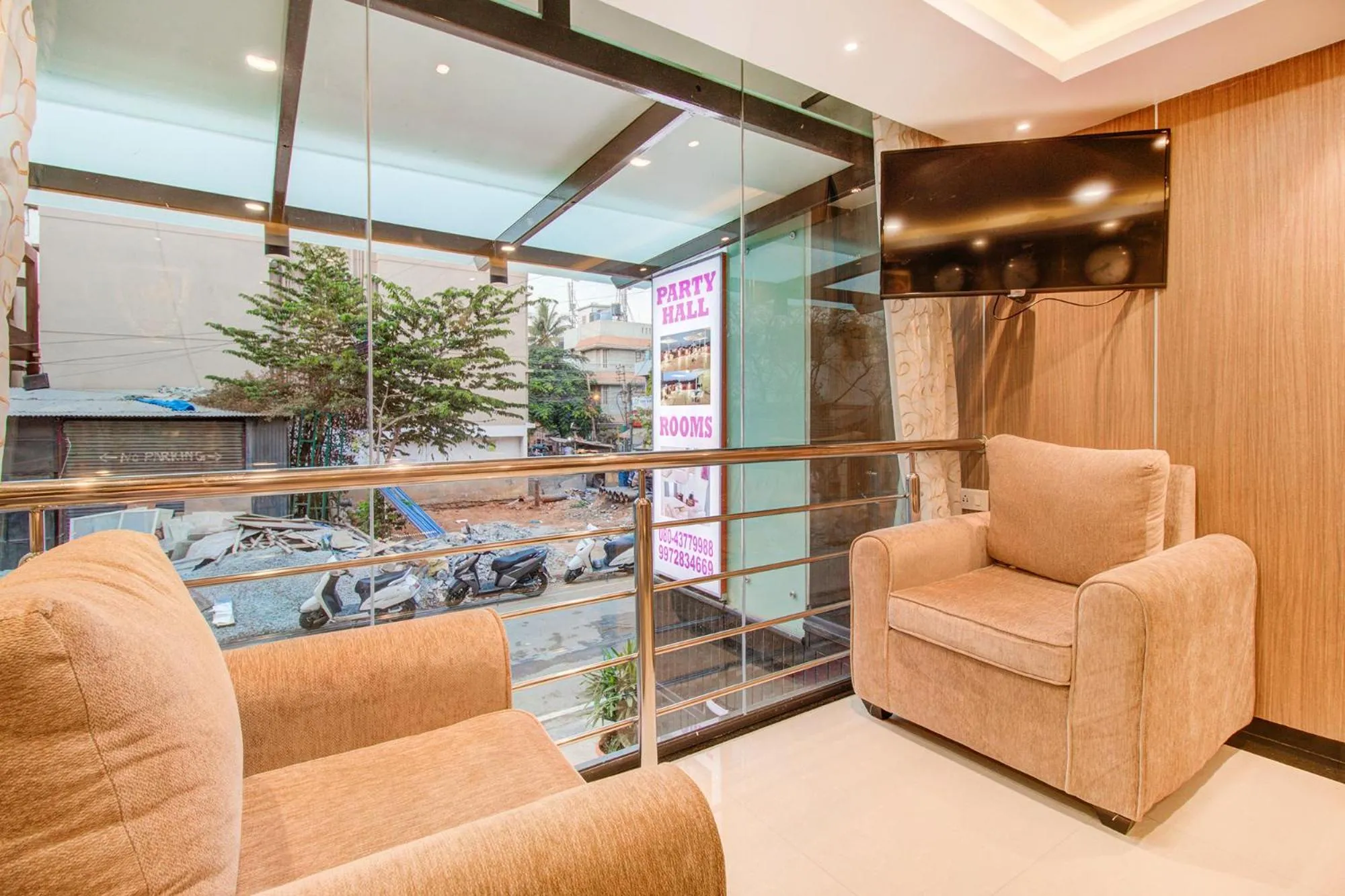 Seating area in FabHotel The Royal Suites - Nr Gopalan innovation mall