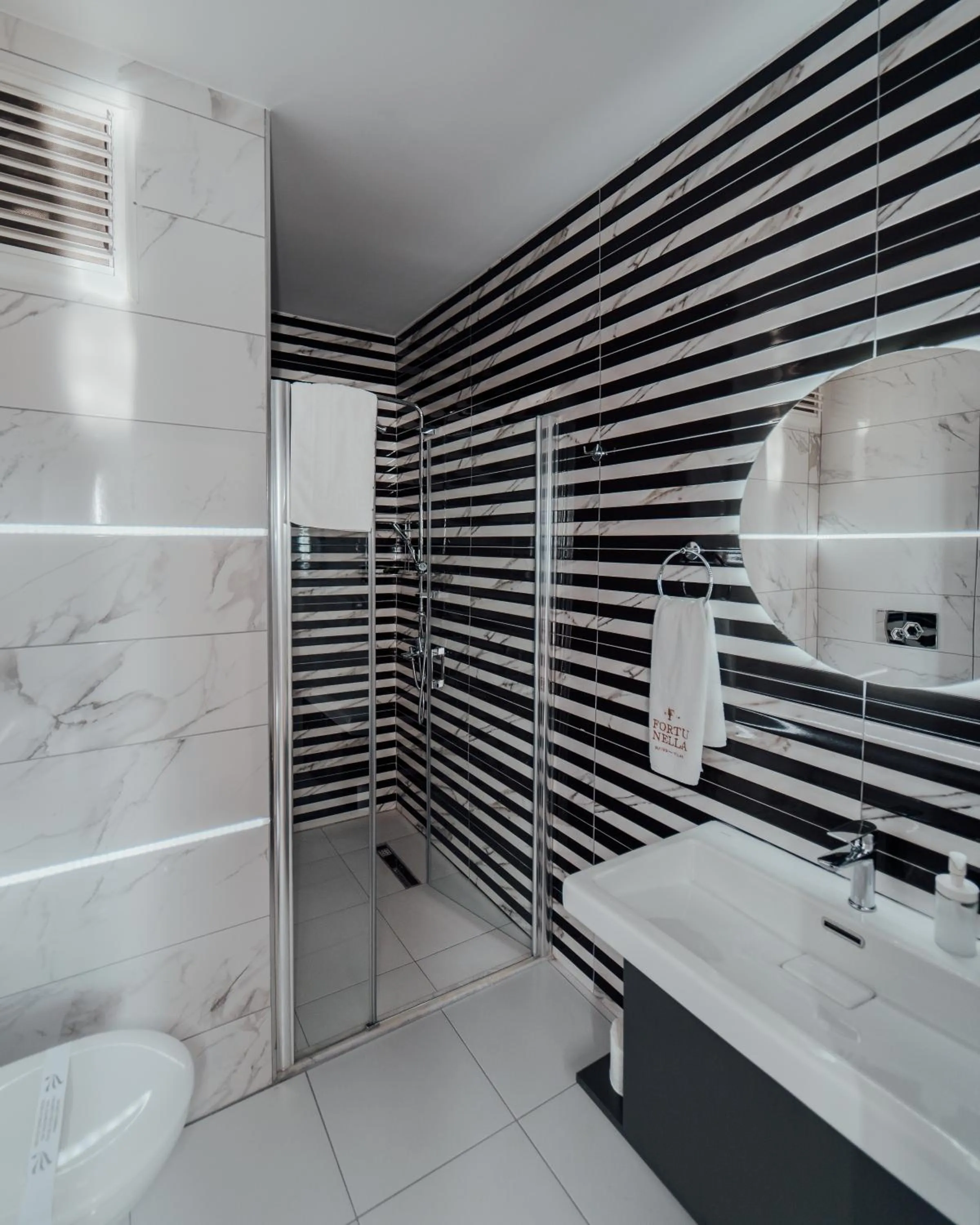 Bathroom in Fortunella Suites