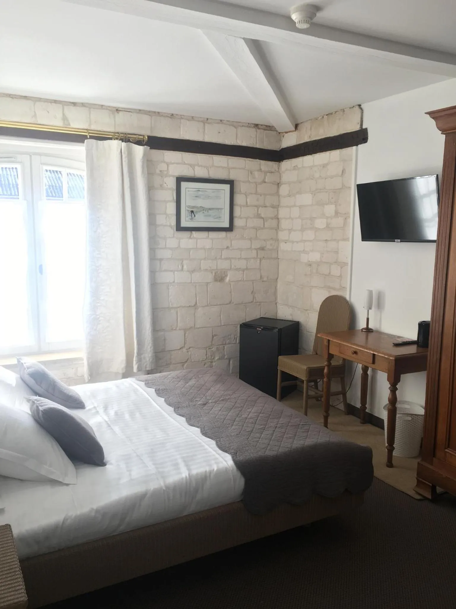 Bed in HÔTEL JEAN DE BRUGES