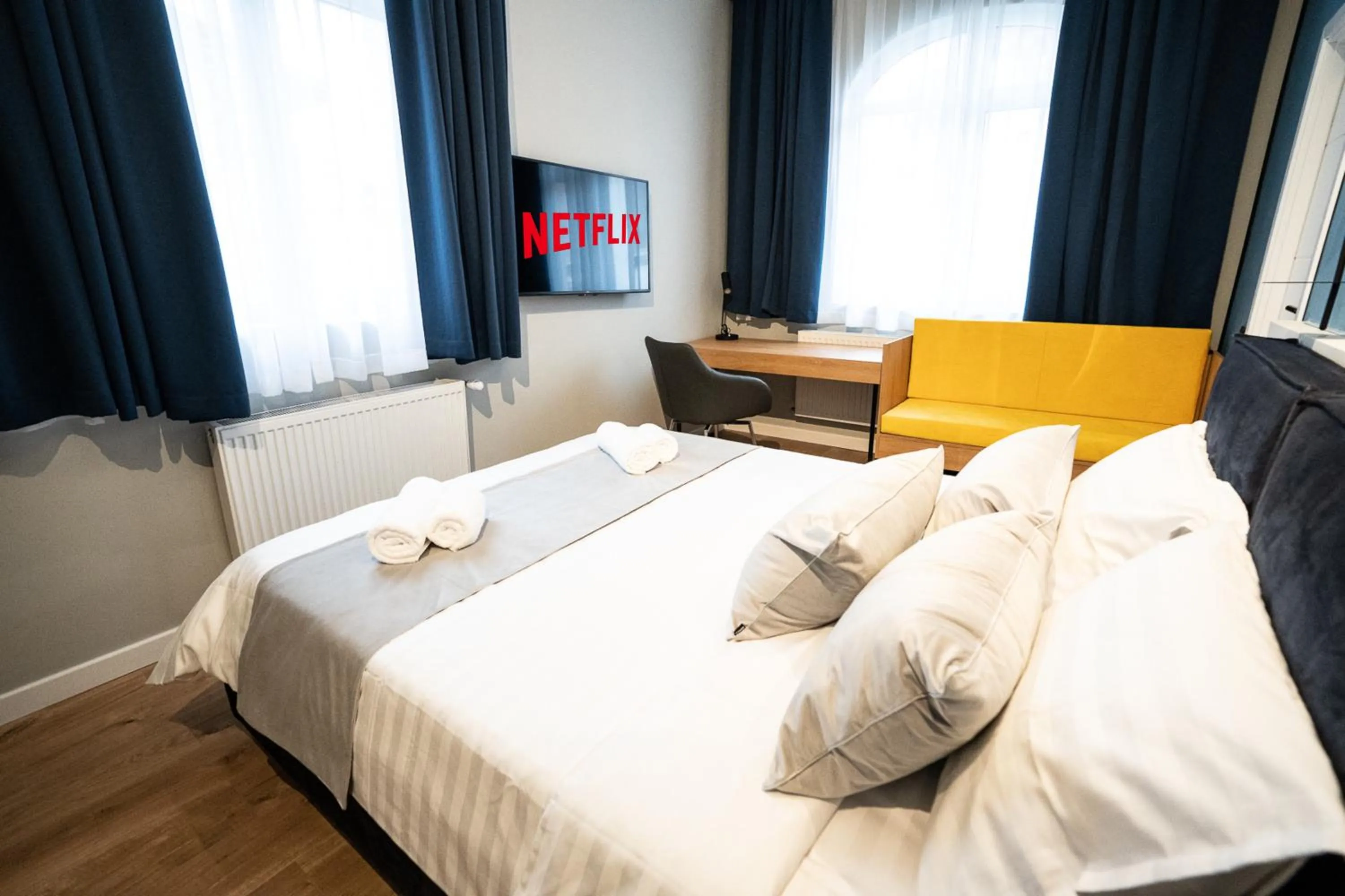 Photo of the whole room, Bed in Emil Balaban Luxury Apart-Hotel