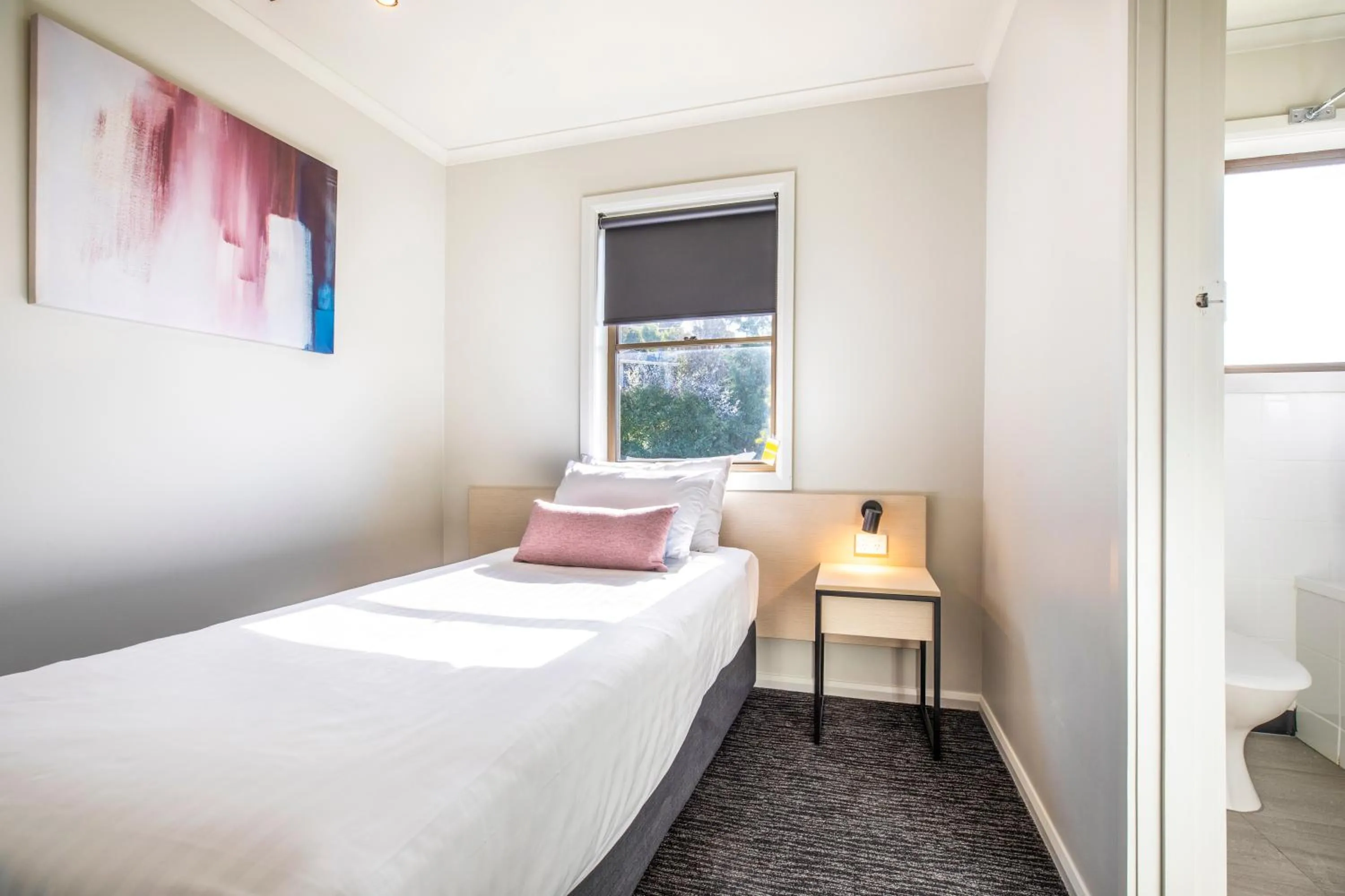 Bed in Nightcap at Riverside Hotel