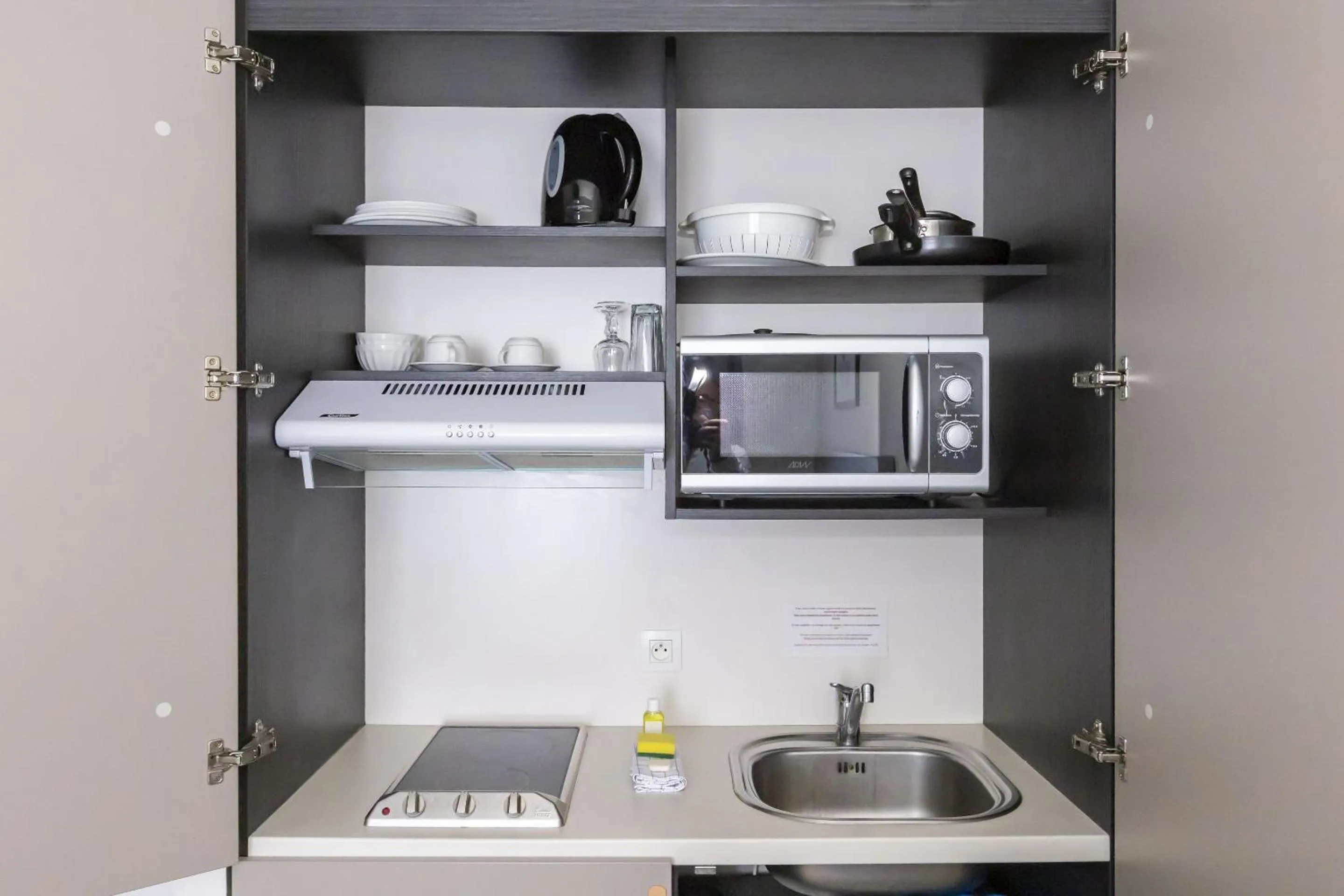 Kitchen or kitchenette in Appart Hotel Odalys City Strasbourg Green Marsh