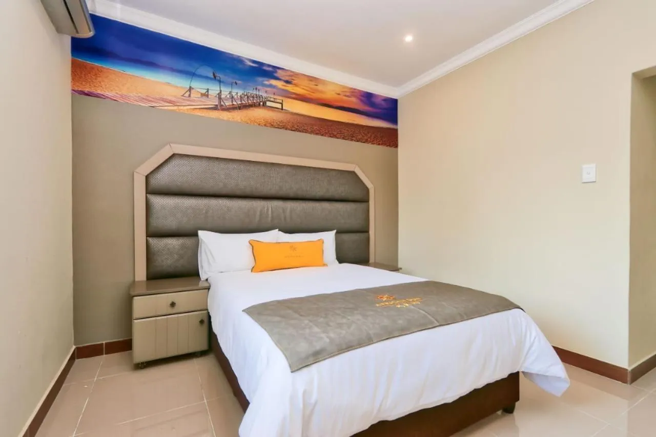 Bed in African Sun Lodge