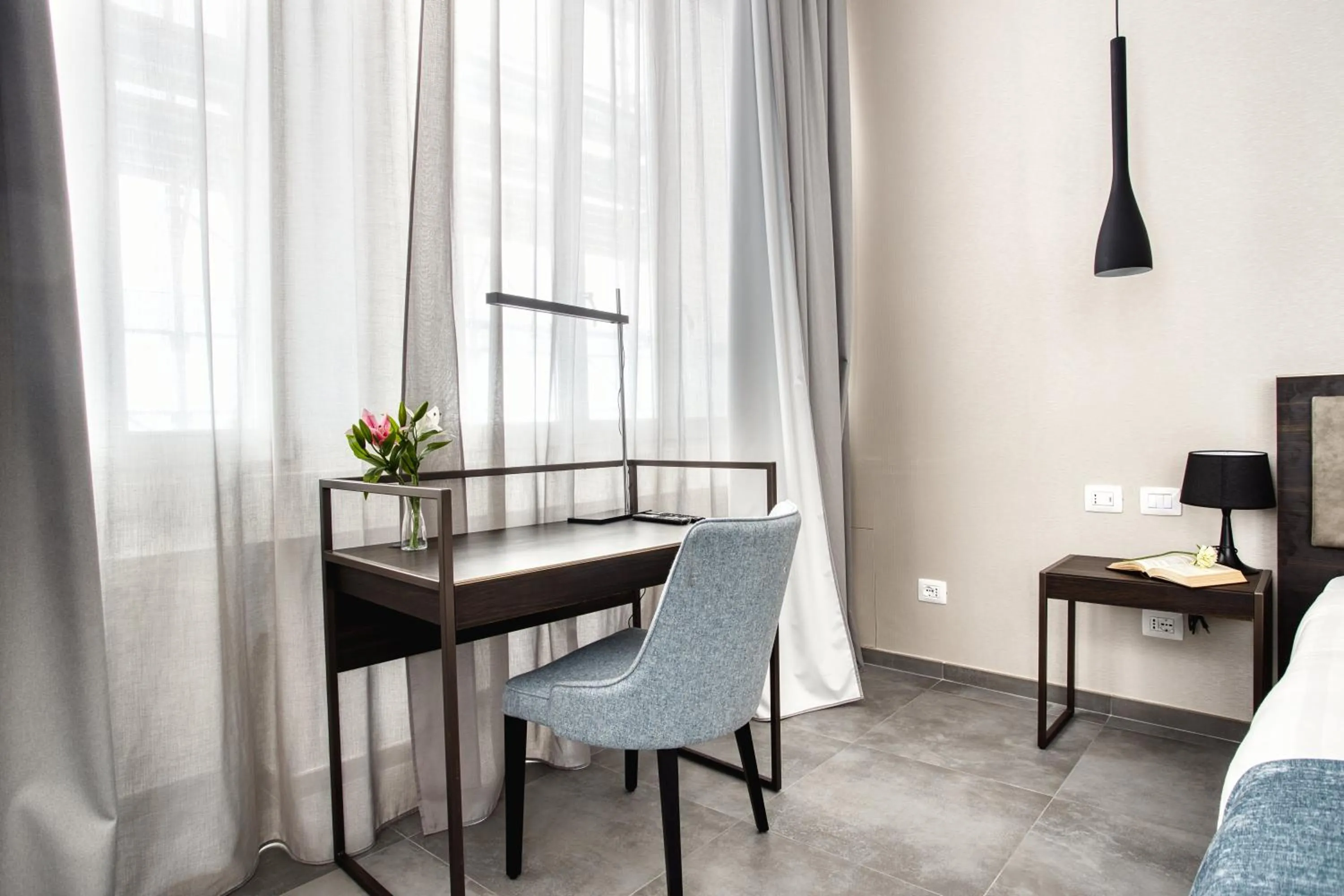 Seating area in JOIVY Spadari