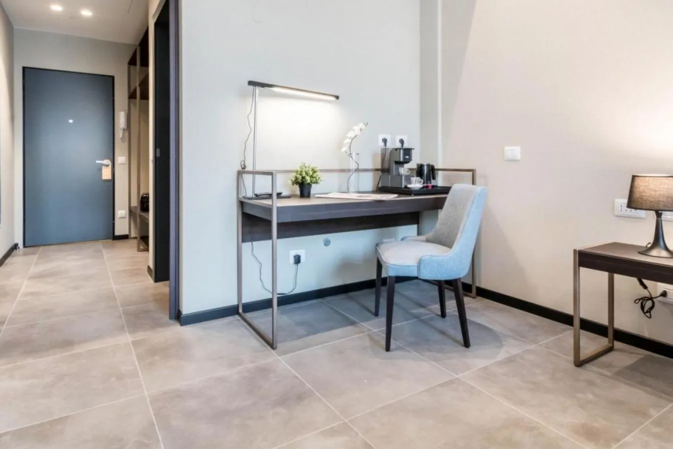 Seating area in JOIVY Spadari