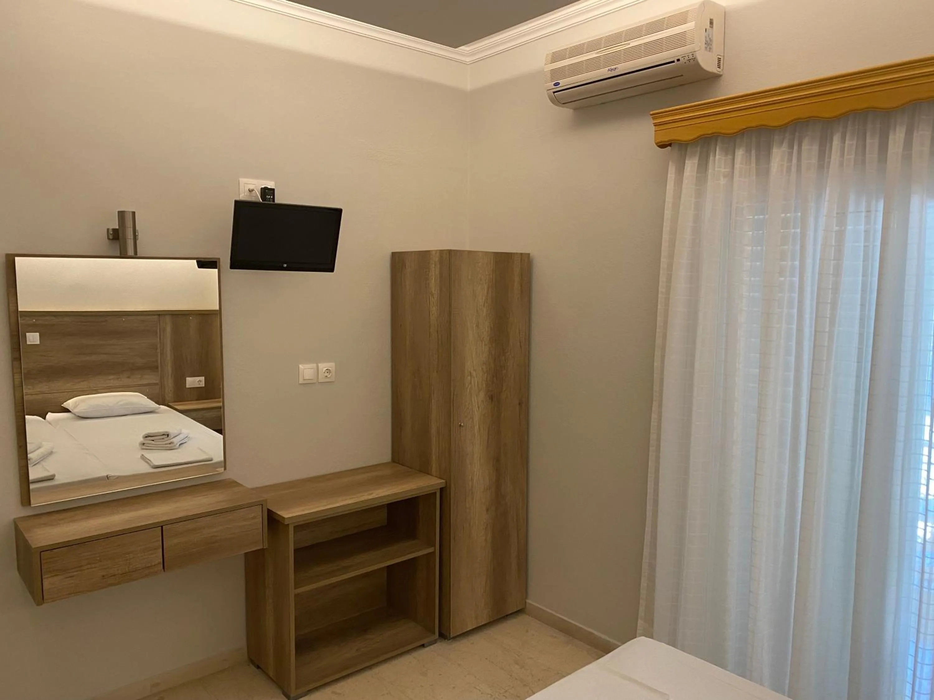 Bed in Hotel Filoxenia