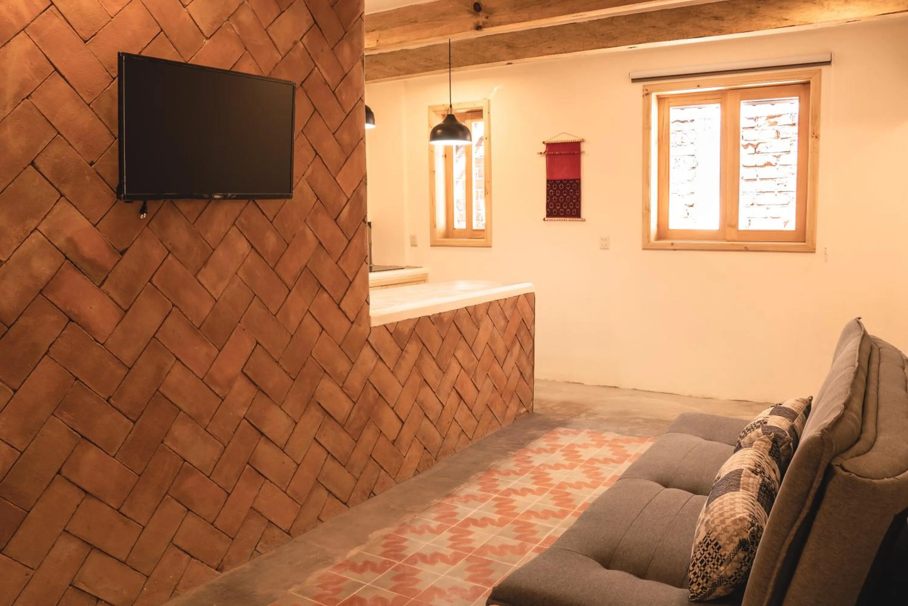 Communal lounge/ TV room in Hotel Mansion Primavera