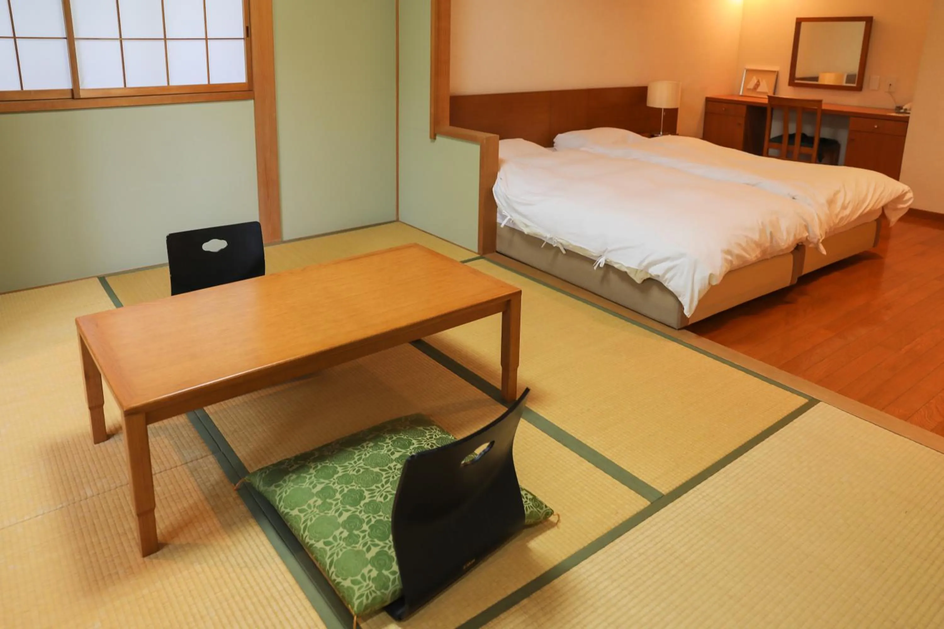Bed in Ajisai Onsen Ryokan - Award Winning Private Open Air Onsen