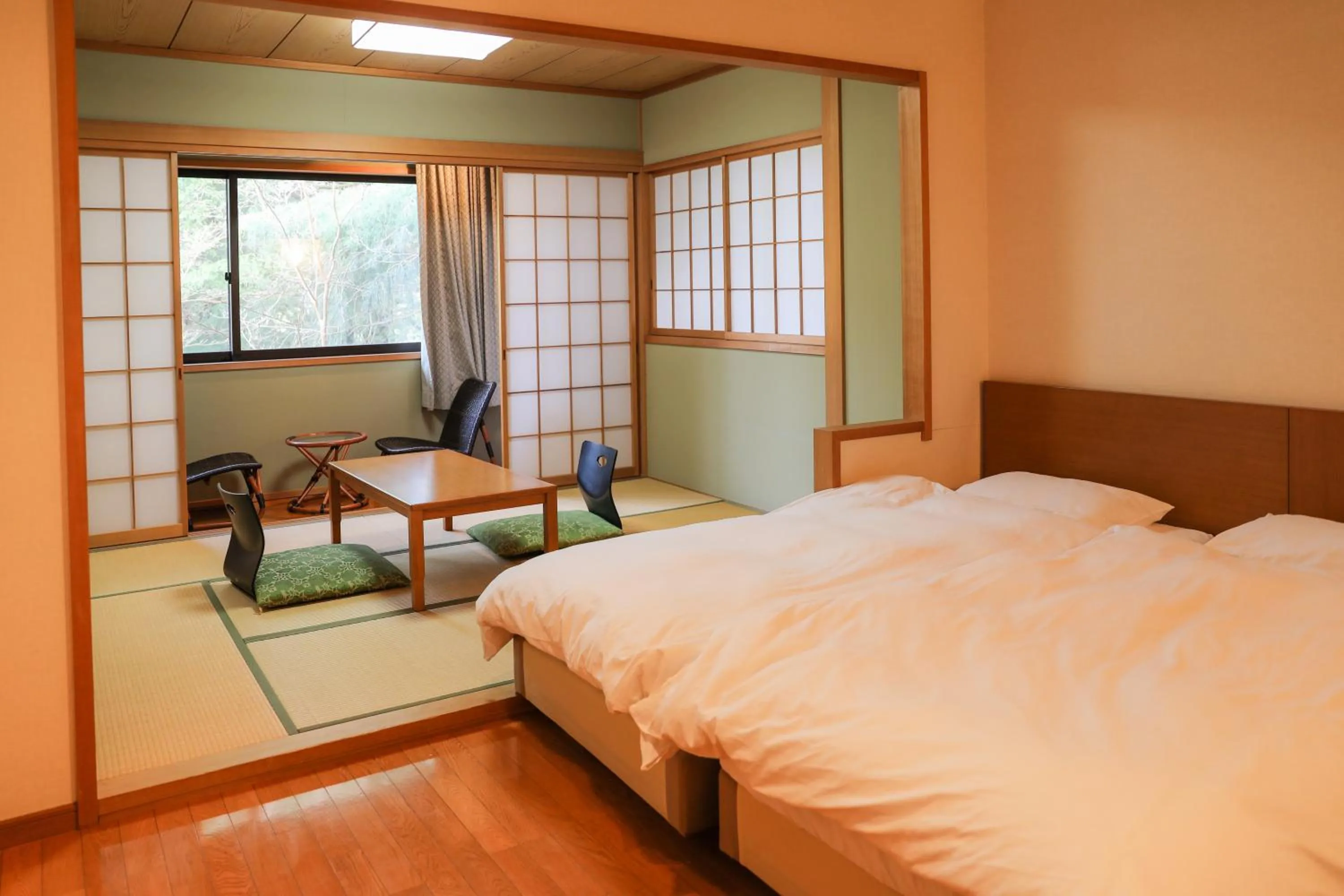 Bed in Ajisai Onsen Ryokan - Award Winning Private Open Air Onsen