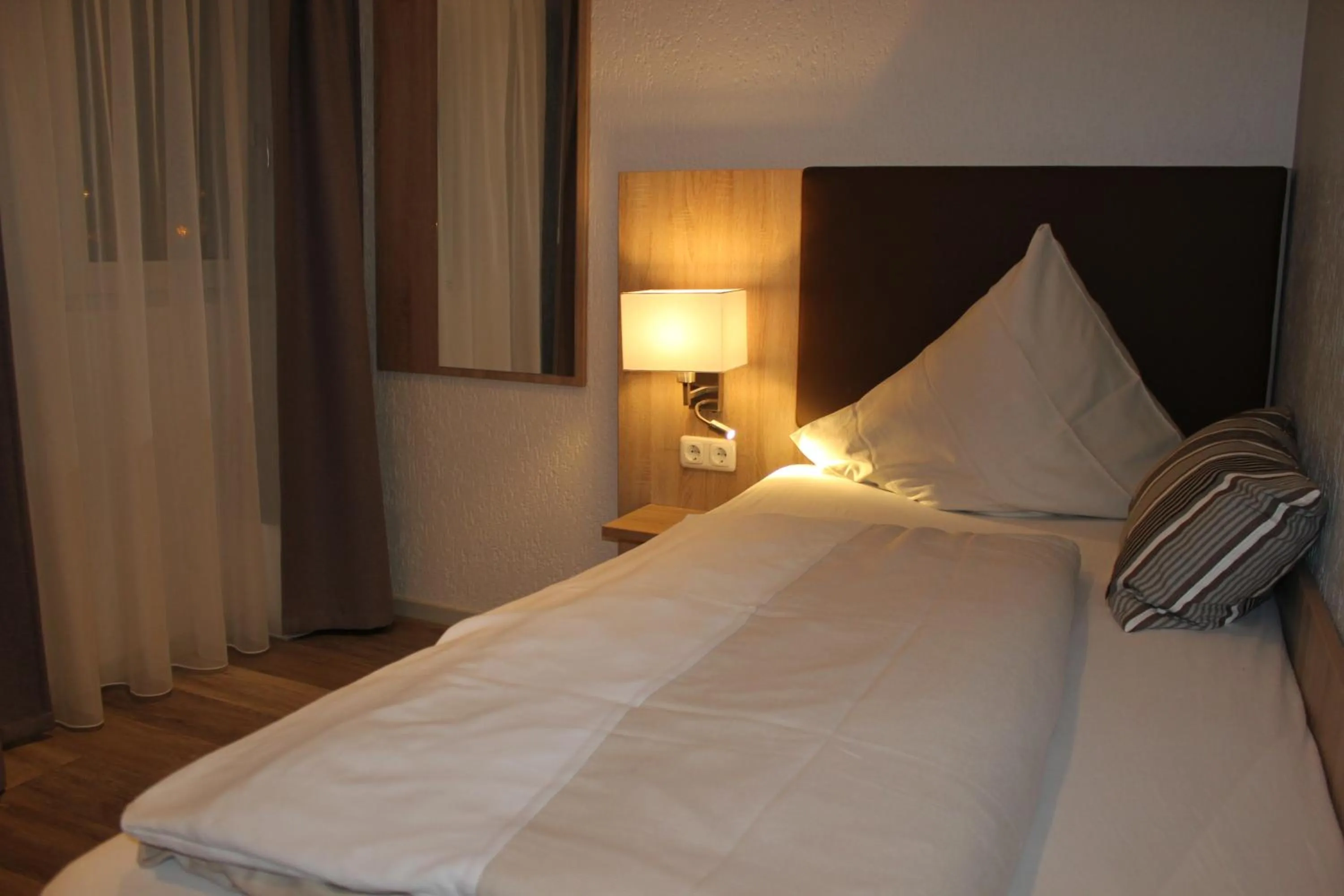 Bed in Hotel Restaurant Kromberg